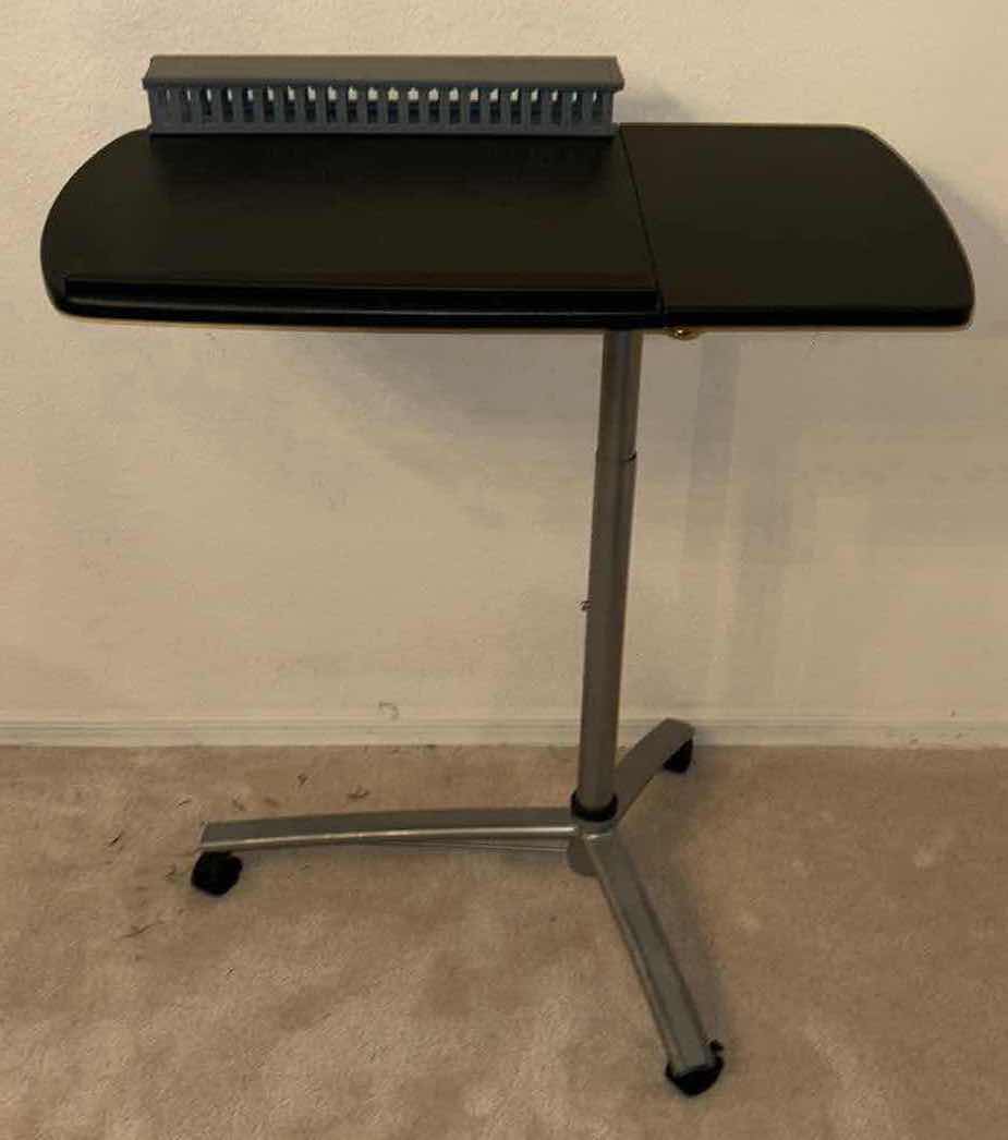 Photo 1 of ROLLING ADJUSTABLE DESK STAND W LAP TOP RISER