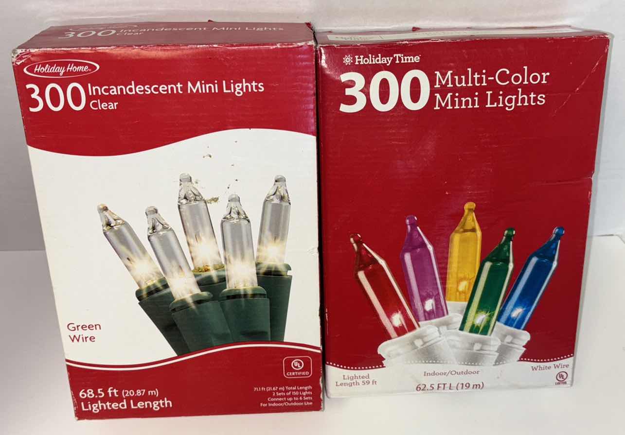 Photo 1 of NEW 2 BOXES CHRISTMAS LIGHT STRANDS- 300 INCANDESCENT CLEAR MINI LIGHTS (68.5’ LIGHTED LENGTH) & 300 MULTI-COLOR MINI LIGHTS (LIGHTED LENGTH 59 FT)