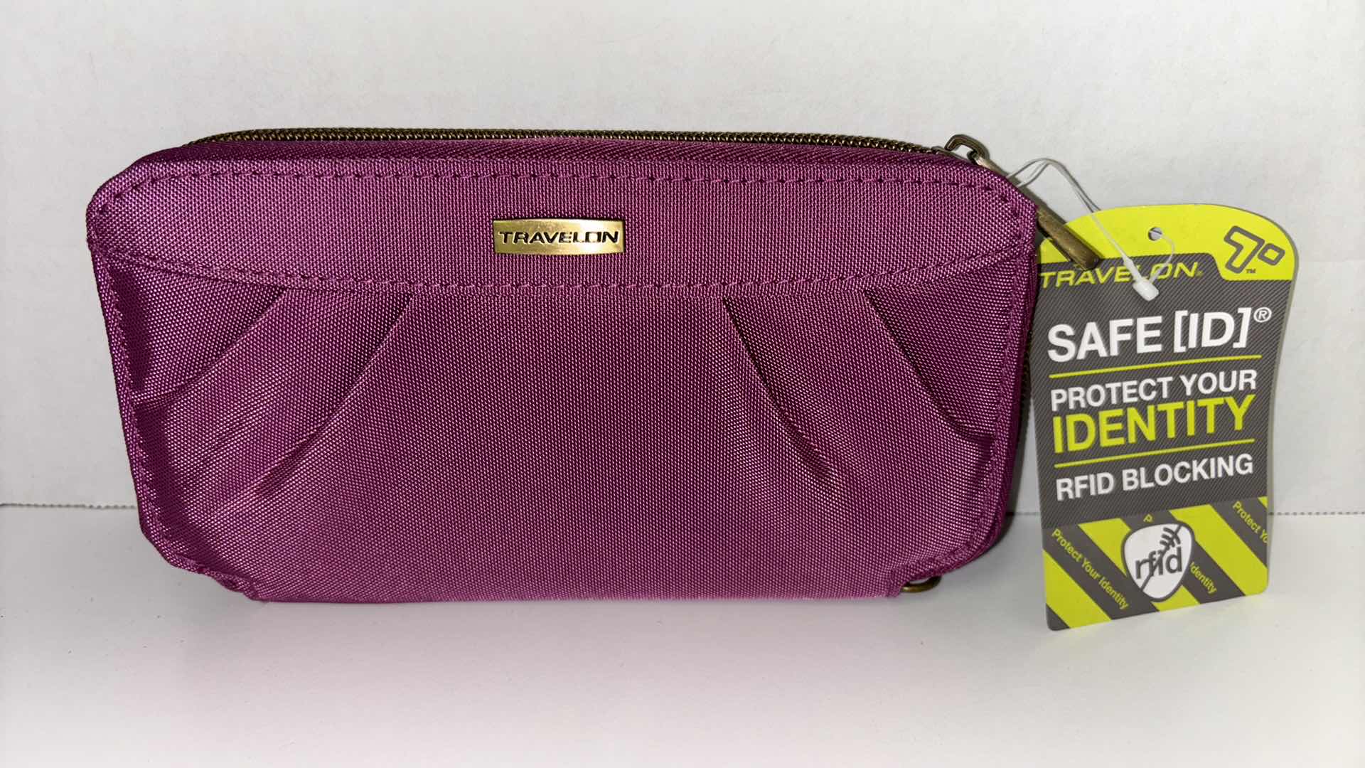 Photo 1 of NEW TRAVELON SAFE ID RFID BLOCKING SIGNATURE  PLEATED DOUBLE ZIP WALLET (COLOR: FUCHSIA) 7.75” X 1” H4”