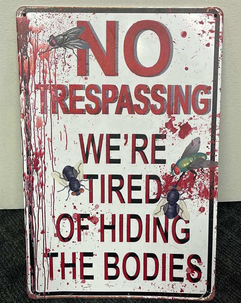 Photo 1 of NO TRESPASSING TIN SIGN 8” X 12”