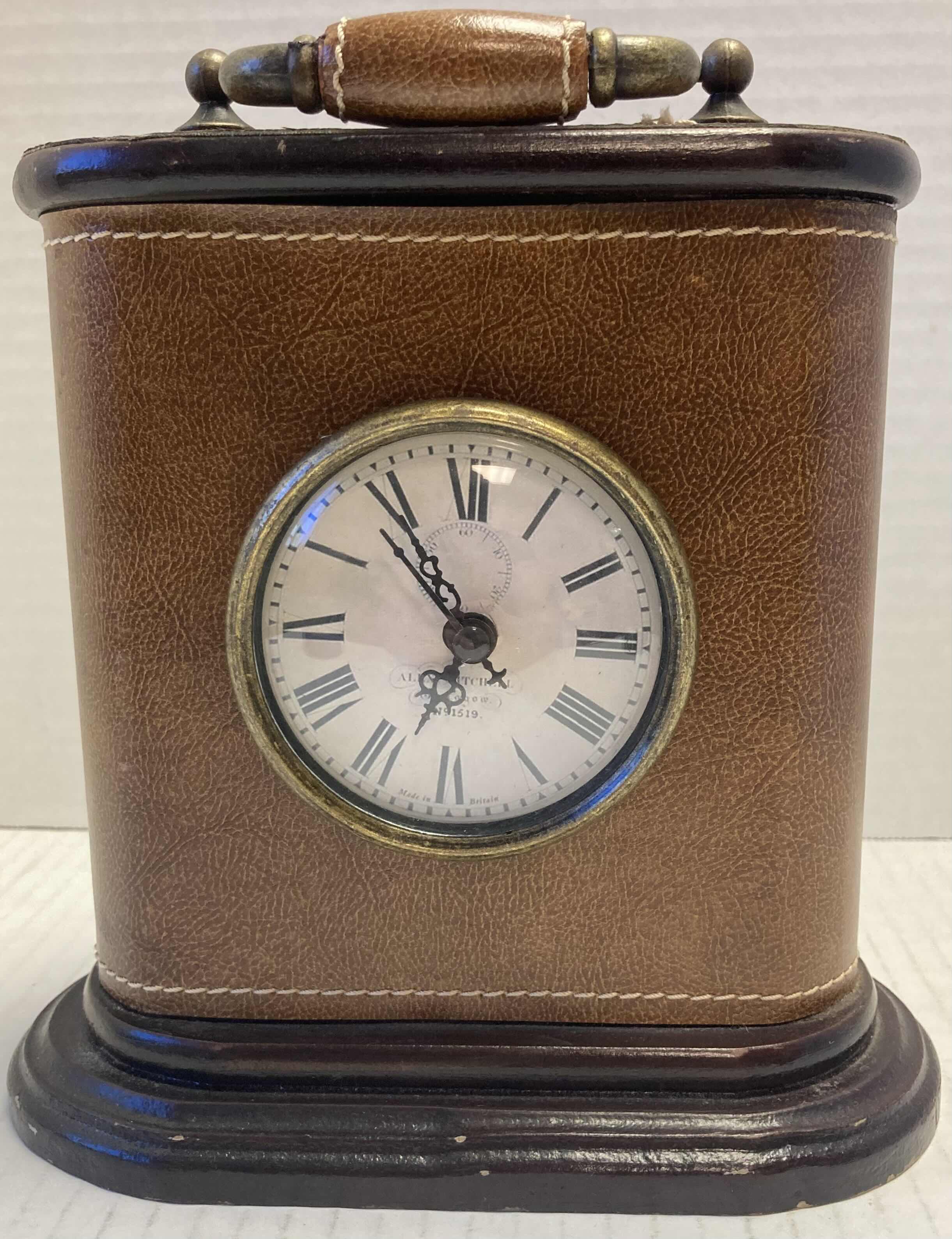 Photo 1 of ALEX MITCHELL LEATHER/WOOD BATTERY OPERATED CLOCK 8” X 4” H7”