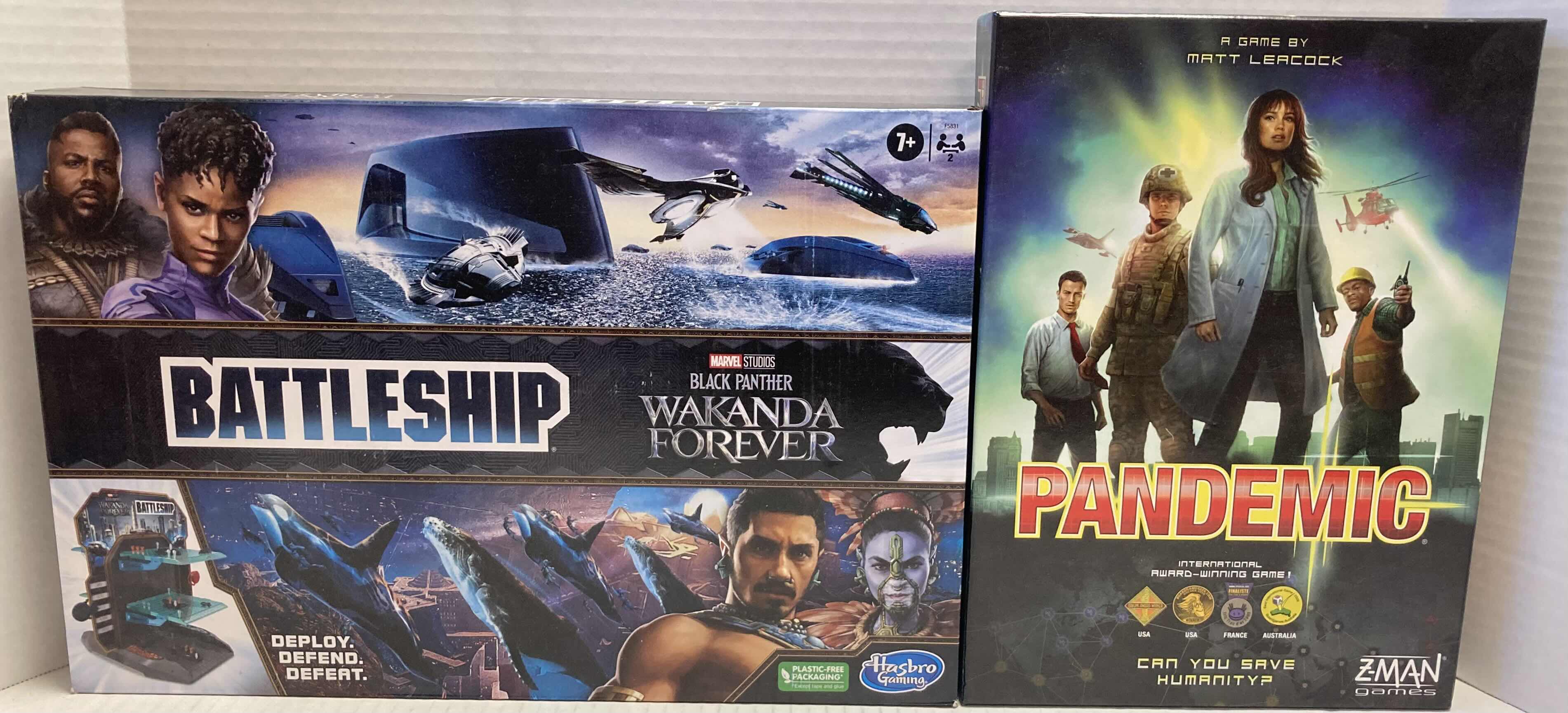 Photo 1 of HASBRO GAMING BATTLESHIP BLACK PANTHER WAKANDA FOREVER EDITION & ZMAN GAMES PANDEMIC BOARD GAME