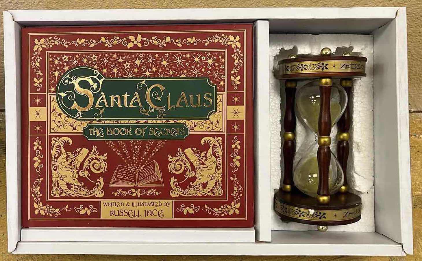 Photo 1 of SANTA CLAUS THE BOOK OF SECRETS BY RUSSEL INCE W DECORATIVE HOUR GLASS