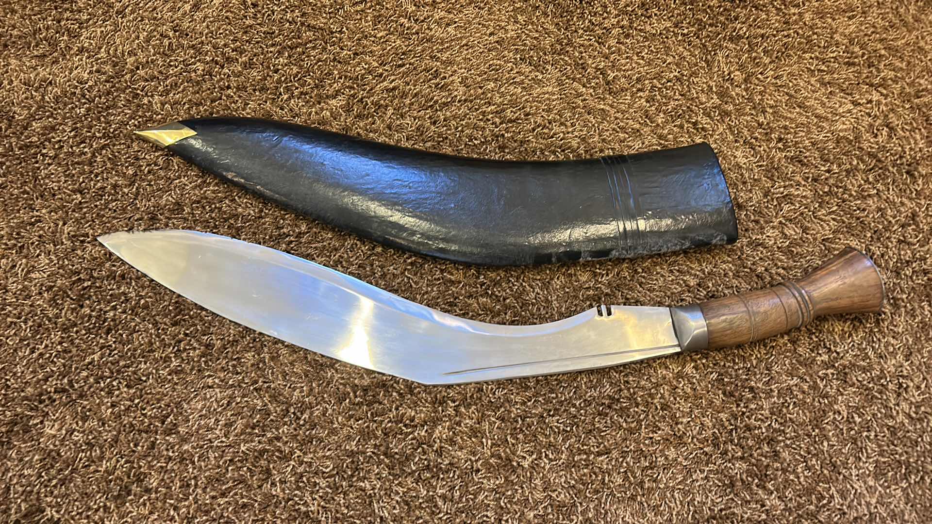 Photo 9 of MACHETE WITH LEATHER AND BRASS SHEATH 31.5” FROM TIP TO HANDLE (BLADE 23.5”)