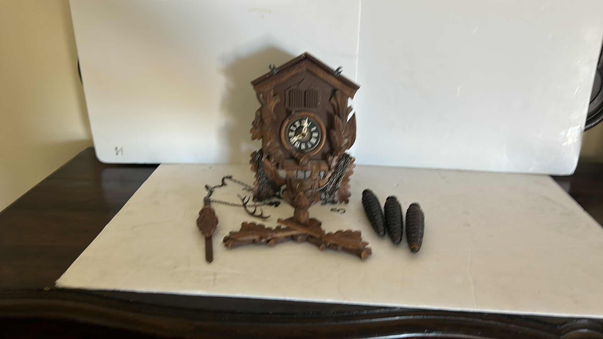 Photo 12 of VINTAGE COO COO CLOCK ( NEEDS GLUING) IN WICKER BASKET