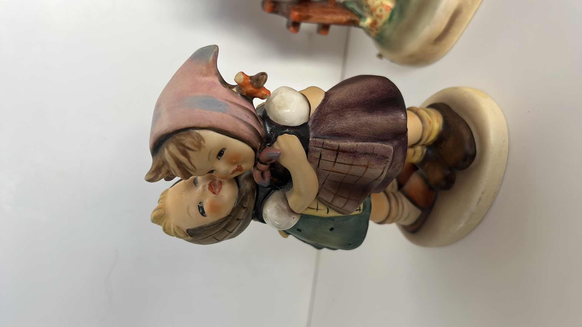 Photo 3 of 2 - COLLECTIBLE NUMBERED GOEBEL PORCELAIN FIGURINES FROM WEST GERMANY