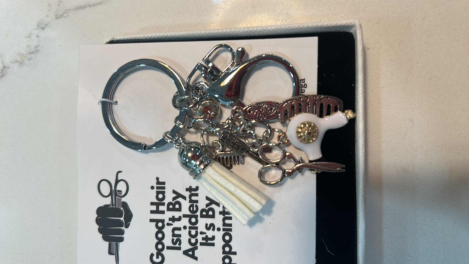 Photo 2 of NEW KEY RING FOR HAIRSTYLIST