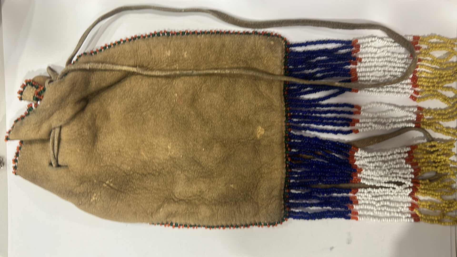 Photo 3 of VINTAGE INDIAN LEATHER BEADED MEDICINE POUCH WITH BOOK