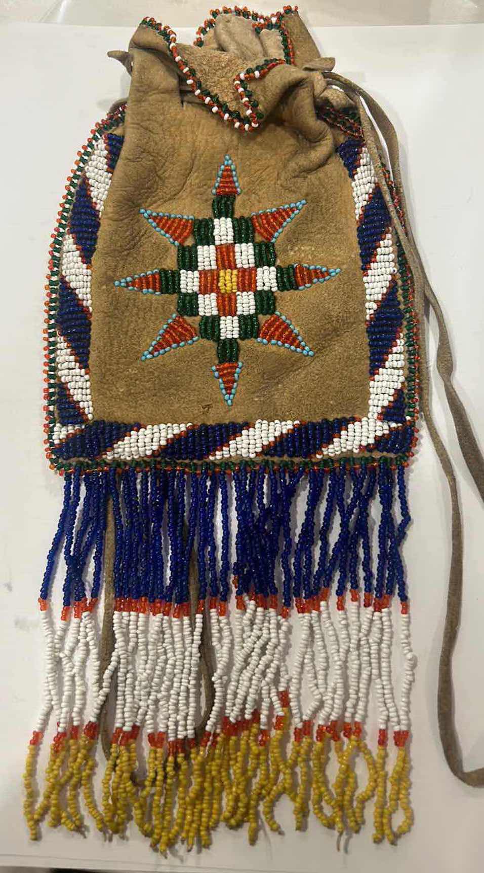 Photo 1 of VINTAGE INDIAN LEATHER BEADED MEDICINE POUCH WITH BOOK