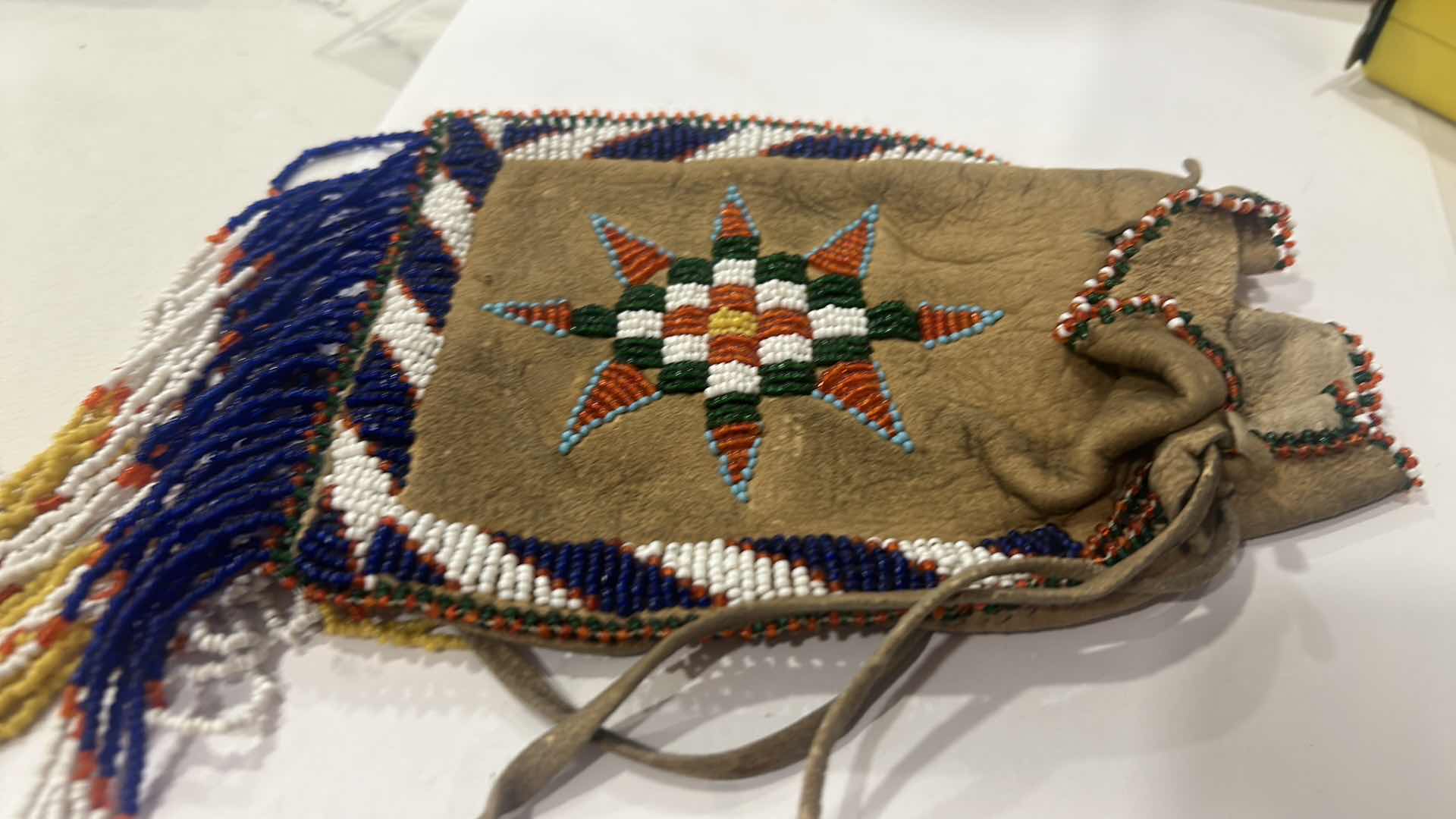 Photo 4 of VINTAGE INDIAN LEATHER BEADED MEDICINE POUCH WITH BOOK