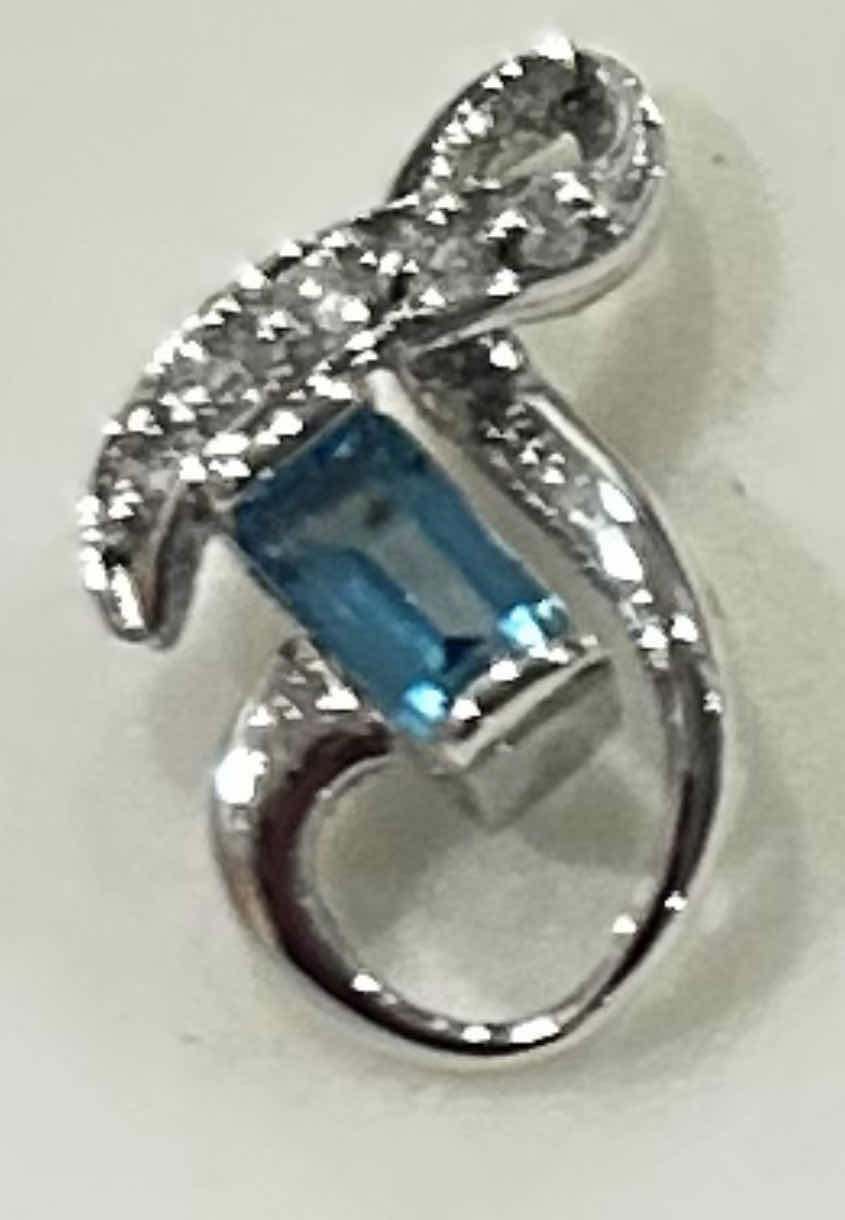 Photo 1 of FINE JEWELRY- .925 STERLING SMALL SILVER PENDANT WITH BLUE TOPAZ
