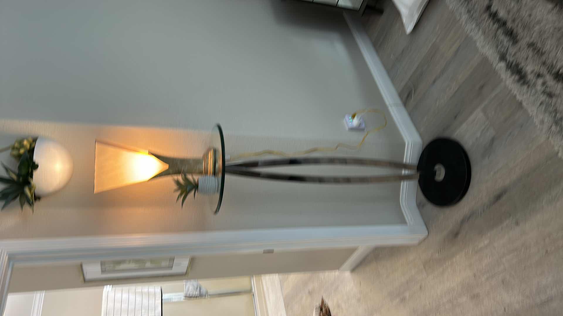 Photo 2 of ELEGANT TALL, MODERN CHROME AND GLASS TOP TABLE WITH HEAVY MARBLE BASE, WITH LAMP AND FAUX PLANT 26” x 50”