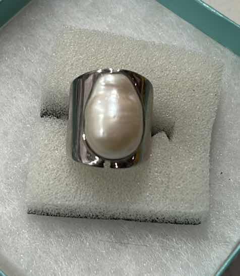 Photo 1 of COSTUME JEWELRY - CL STERLING SILVER RING JUST UNDER 1” LONG, WITH LARGE FRESH WATER PEARL SIZE 7.5