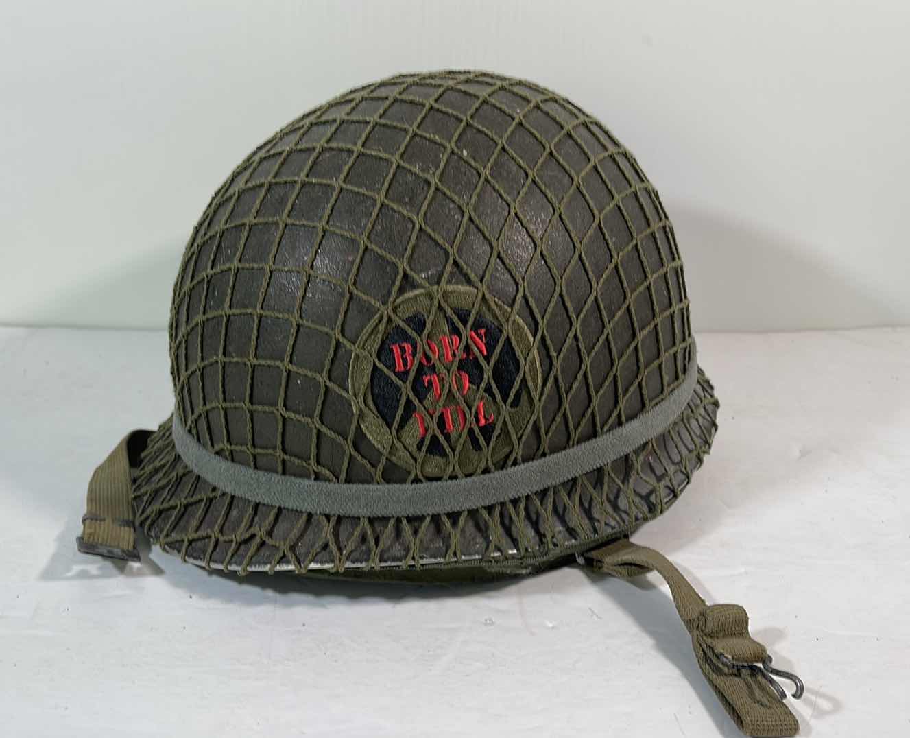 Photo 1 of VINTAGE WWII INFANTRY HELMET H7” WITH NETTING AND BORN TO KILL PATCH