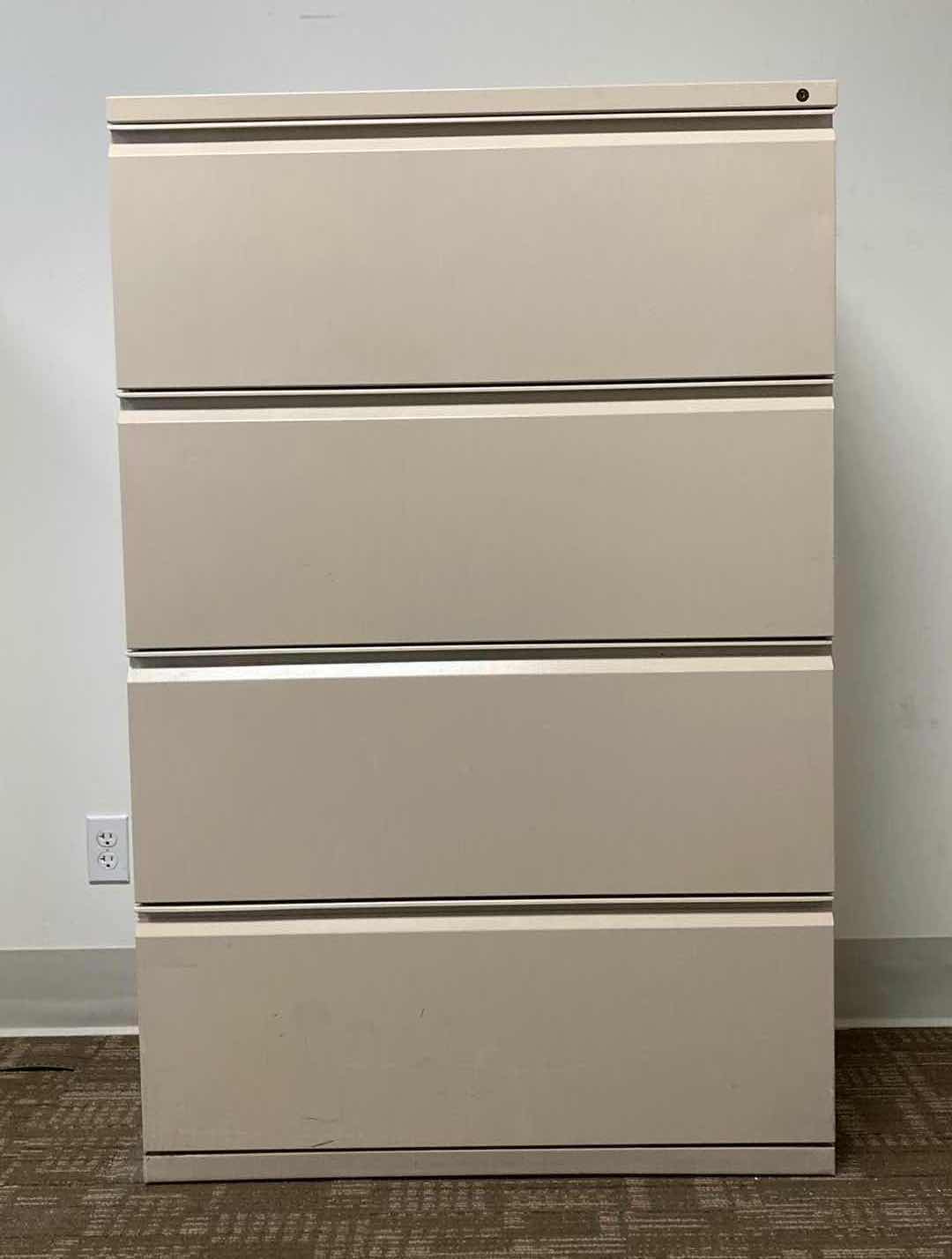 Photo 1 of HERMAN MILLER BEIGE 4 DRAWER LATERAL FILING CABINET 36” X 20” H55”