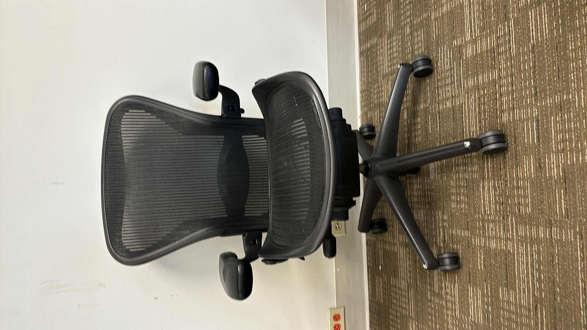 Photo 1 of BLACK SWIVEL AND ADJUSTABLE OFFICE CHAIR