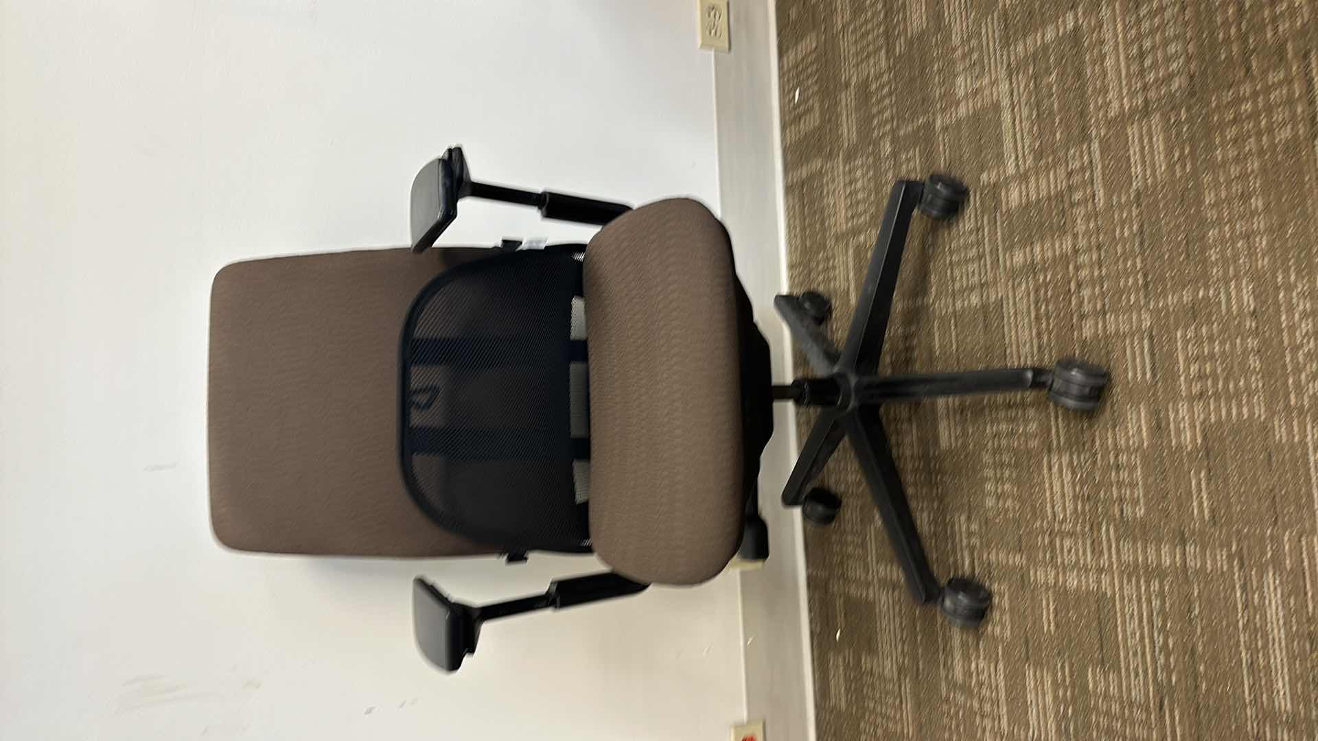 Photo 1 of BROWN SWIVEL AND ADJUSTABLE OFFICE CHAIR