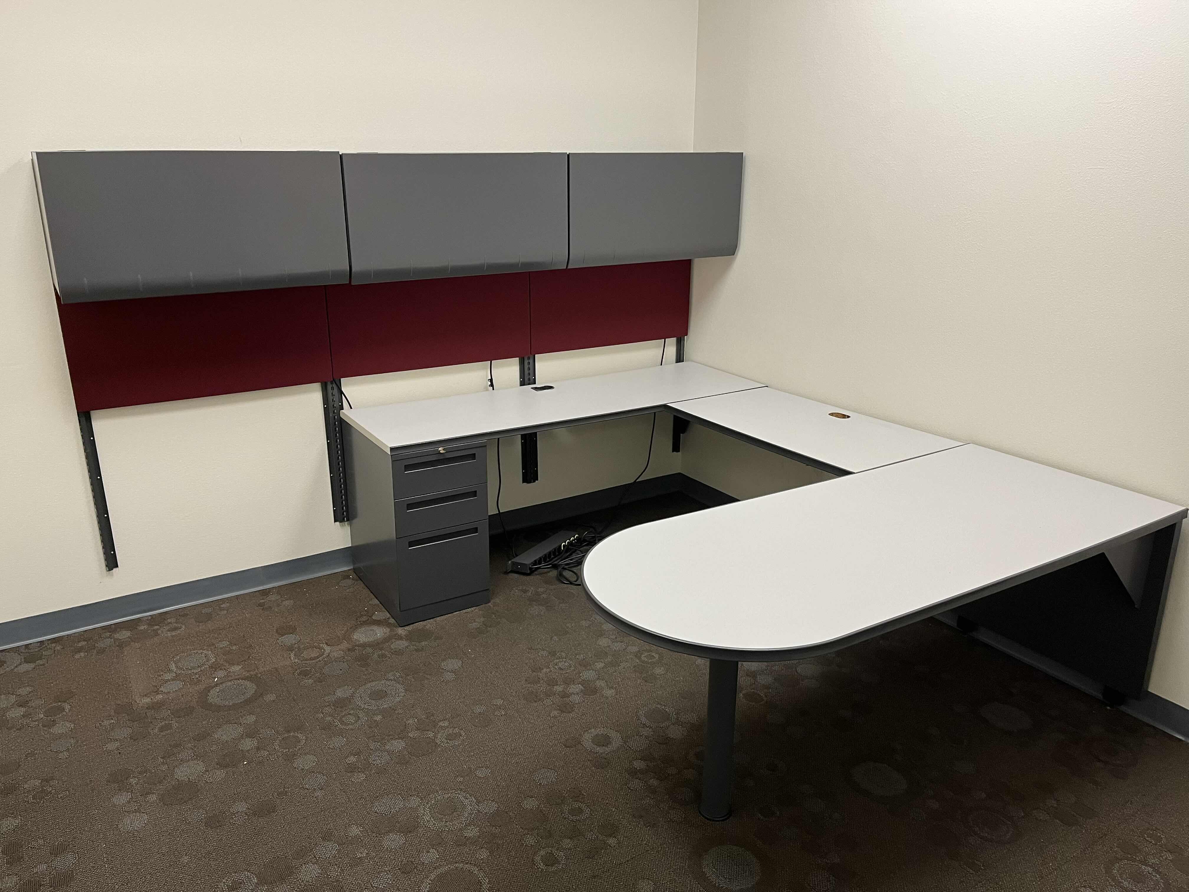 Photo 1 of ALL STEEL U SHAPE WALL MOUNTED OFFICE DESK 95” X 72” H29” & ALL STEEL WALL MOUNTED CABINETS W LIGHTS 108” X 15” H60”