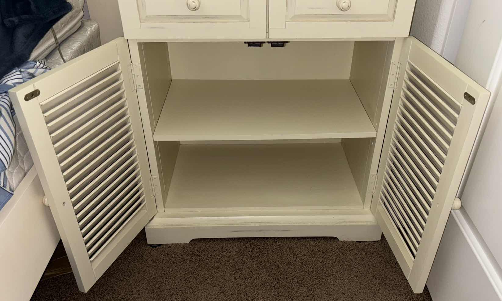 Photo 1 of PIER 1 IMPORTS SHUTTER STYLE TWO DOOR CABINET (DISTRESSED OFF WHITE FINISH) 16.5” X 26.75” H31”