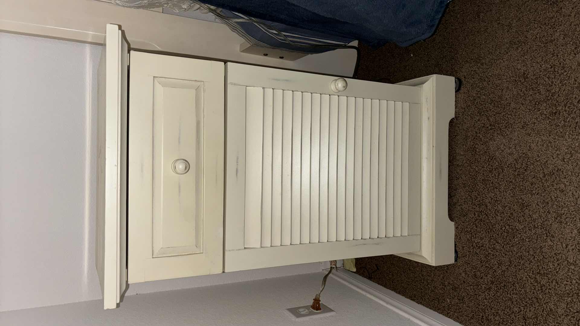 Photo 1 of PIER 1 IMPORTS SHUTTER BEDSIDE CABINET (DISTRESSED OFF WHITE FINISH) 13.75” X 17.75” H30.5”