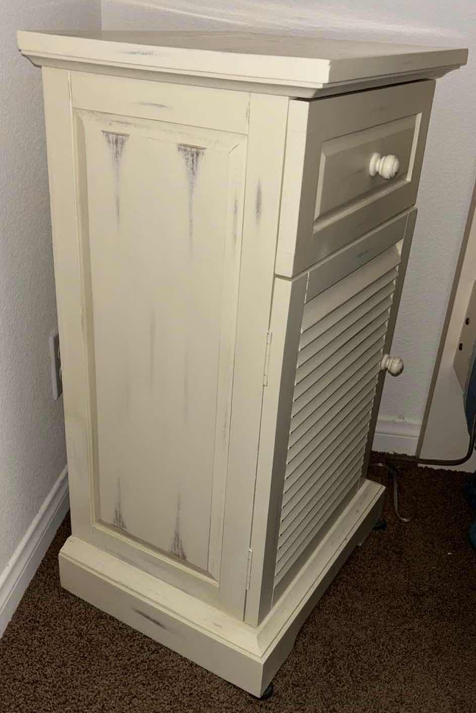 Photo 1 of PIER 1 IMPORTS SHUTTER BEDSIDE CABINET (DISTRESSED OFF WHITE FINISH) 13.75” X 17.75” H30.5”