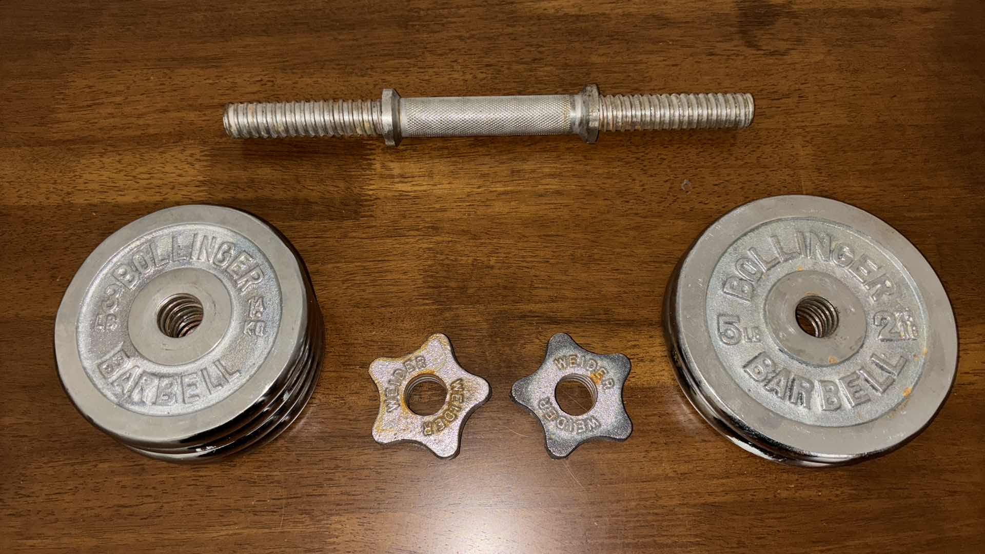Photo 1 of BOLLINGER ADJUSTABLE DUMBBELL, INCLUDES ONE BAR, TWO COLLARS, FOUR 3LB WEIGHTS & TWO 5LB WEIGHTS