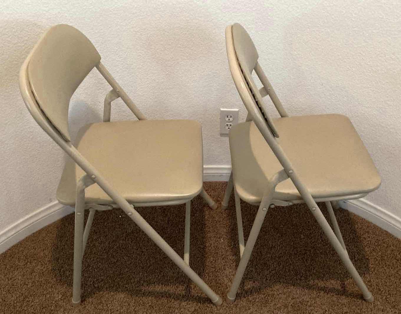 Photo 1 of DONGGUAN SHIN DIN BEIGE VINYL METAL FOLDING CHAIRS