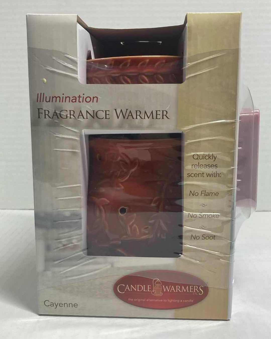 Photo 1 of CANDLE WARMERS ILLUMINATION FRAGRANCE WARMER W APPLE PIE WAX