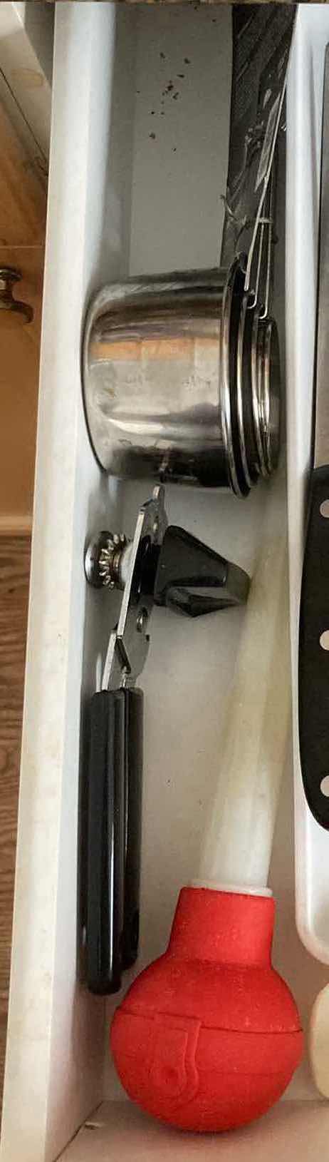 Photo 1 of CONTENTS OF DRAWER-KITCHEN KNIVES, MEASURING CUPS, & CAN OPENER