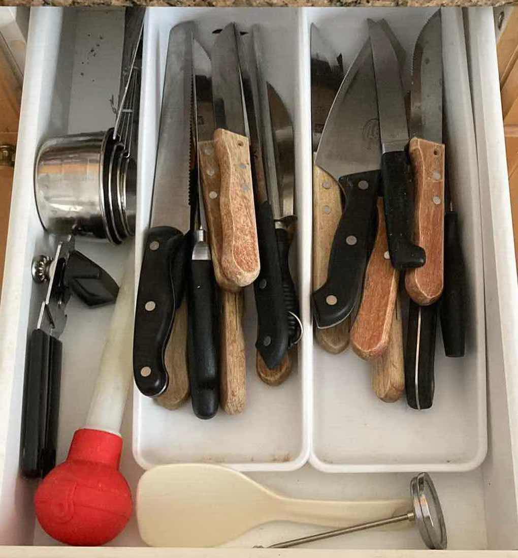Photo 1 of CONTENTS OF DRAWER-KITCHEN KNIVES, MEASURING CUPS, & CAN OPENER