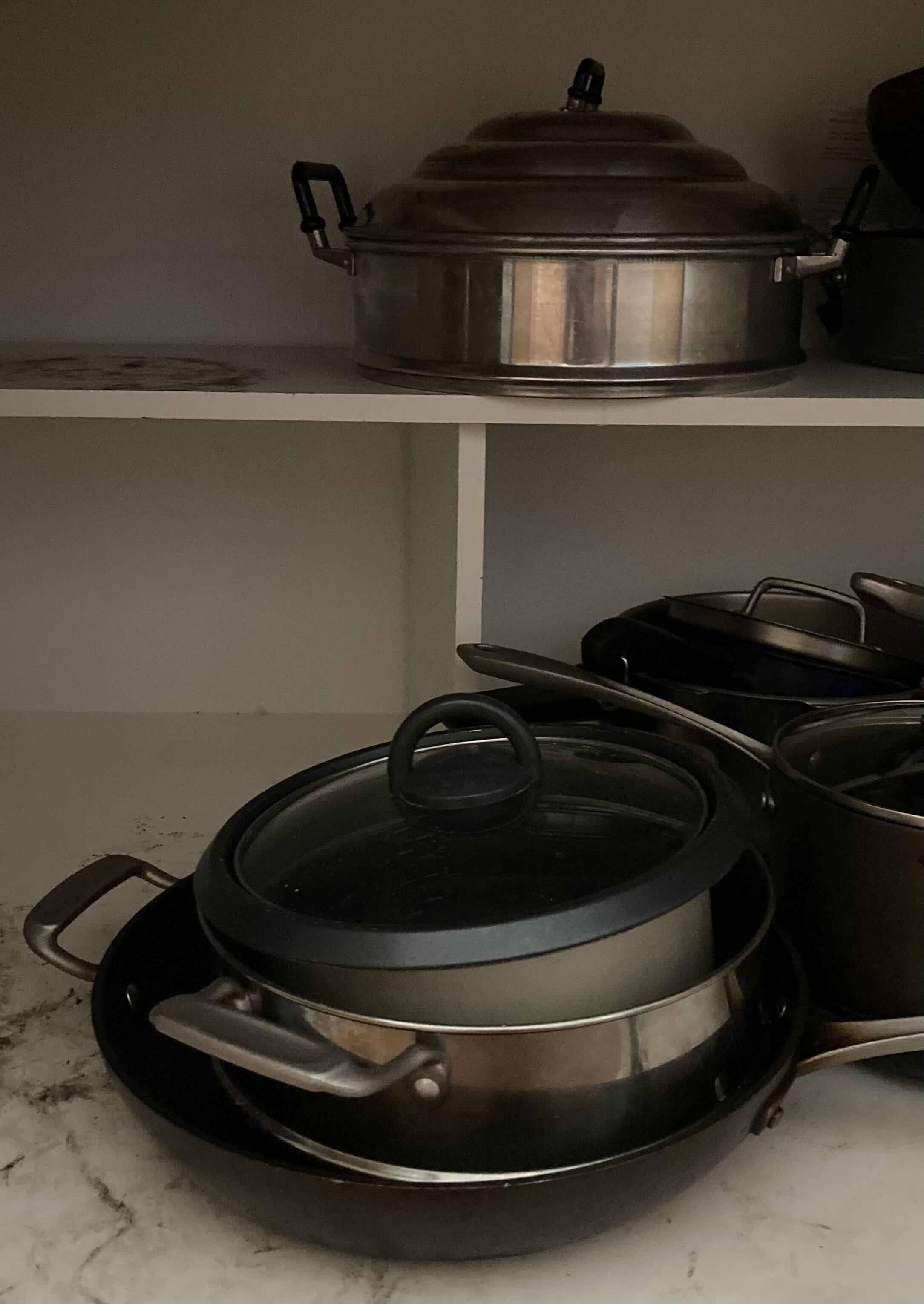 Photo 1 of CONTENTS OF CABINET-POTS & PANS