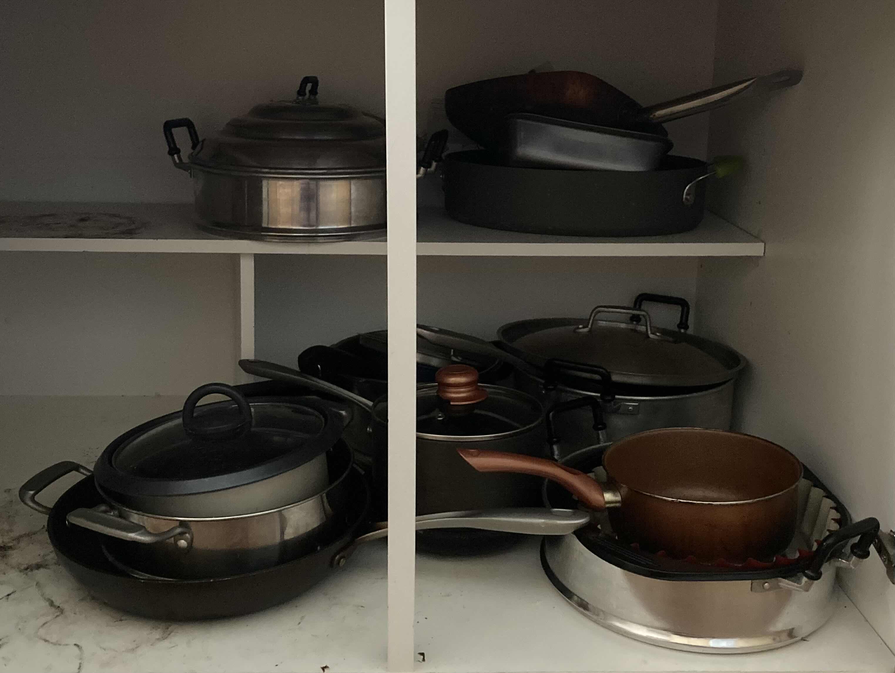 Photo 1 of CONTENTS OF CABINET-POTS & PANS
