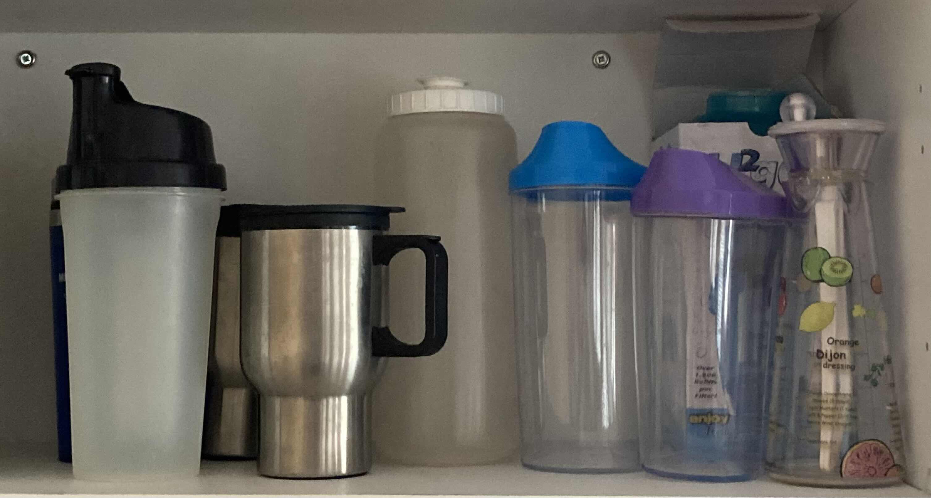 Photo 1 of CONTENTS OF CABINET-WATER CUPS, STORAGE CONTAINERS, & SAUCE BOWLS