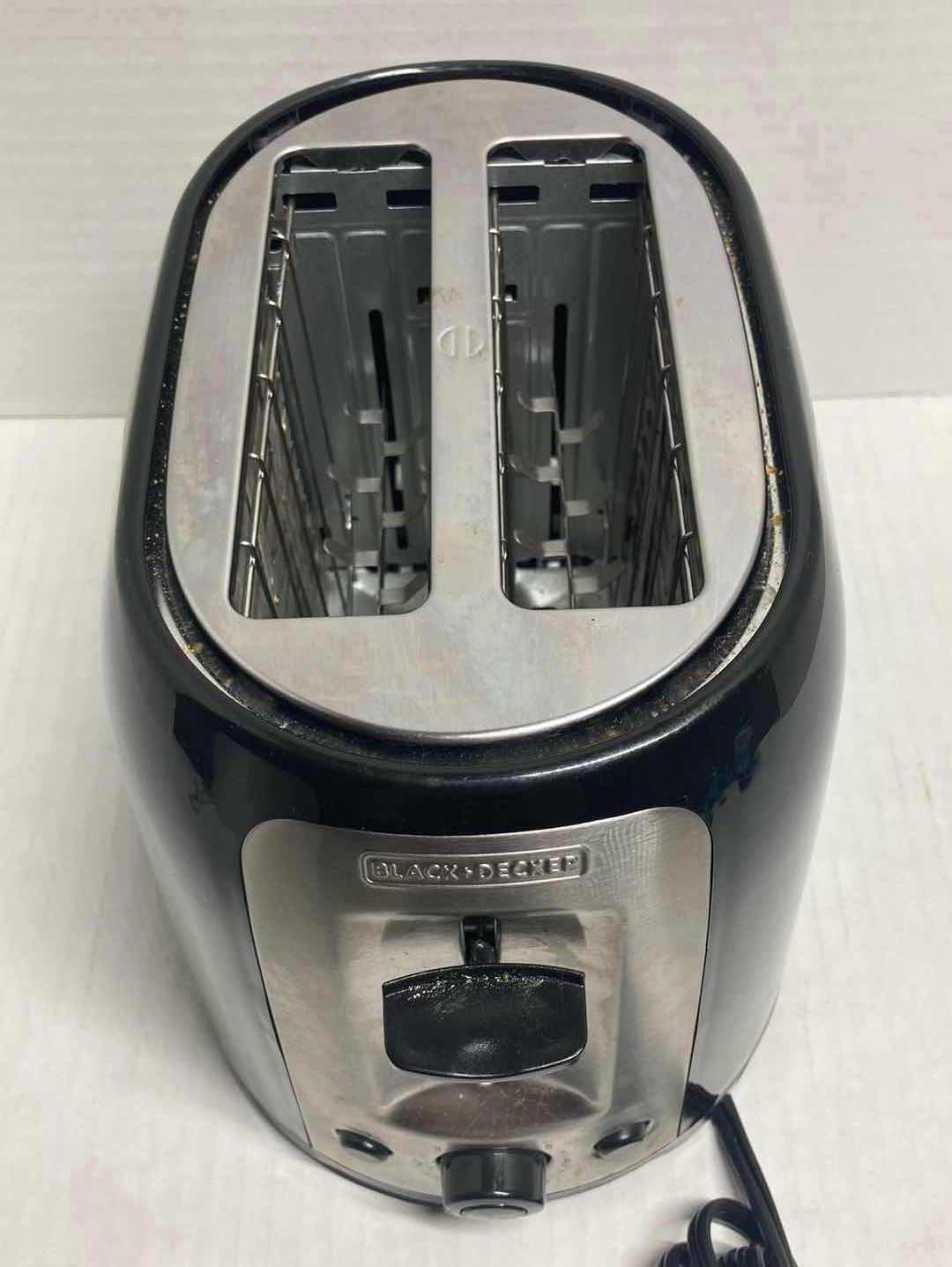 Photo 1 of BLACK & DECKER EXTRA WIDE SLOT 2-SLICE TOASTER MODEL TR1278B