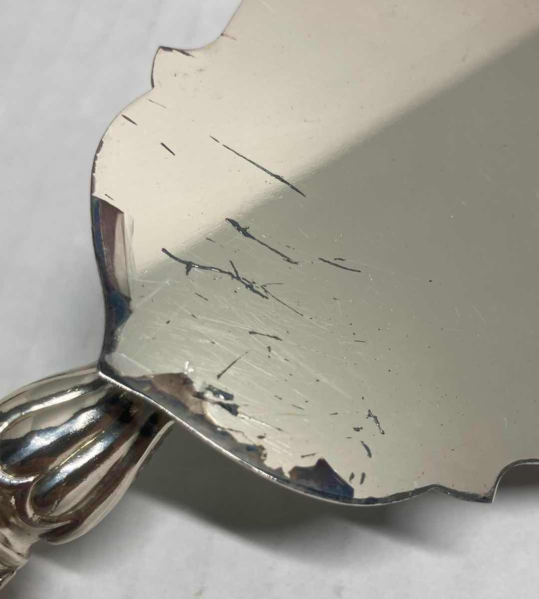 Photo 1 of ANTIQUE VICTORIAN SILVER PLATED CAKE SERVER W CELLULOID HANDLE & INTERNATIONAL SILVER COMPANY SILVER PLATED CAKE SERVER 11.75”