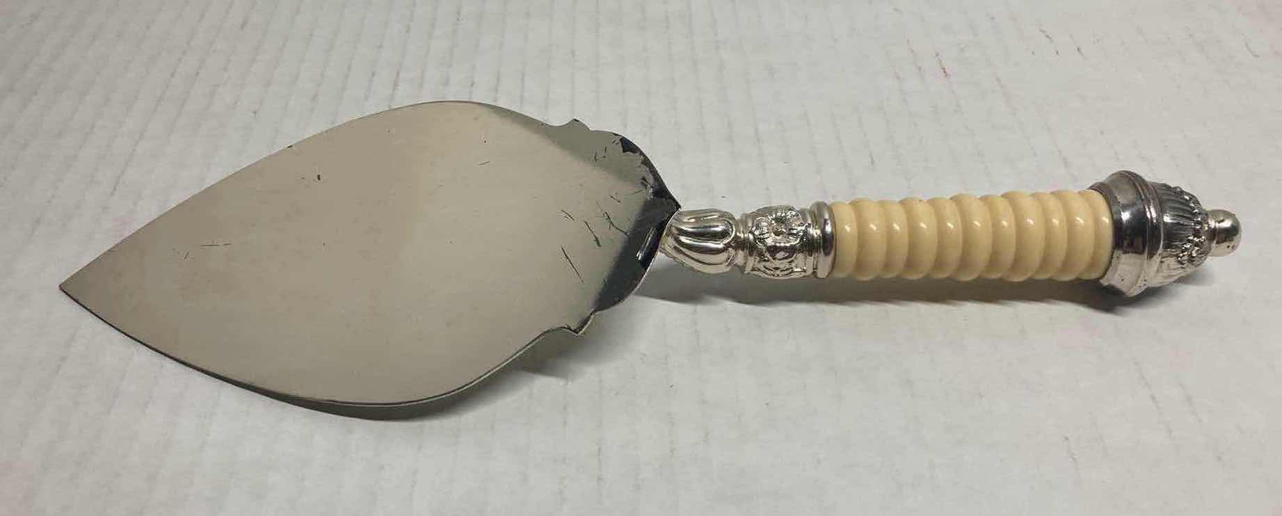 Photo 1 of ANTIQUE VICTORIAN SILVER PLATED CAKE SERVER W CELLULOID HANDLE & INTERNATIONAL SILVER COMPANY SILVER PLATED CAKE SERVER 11.75”