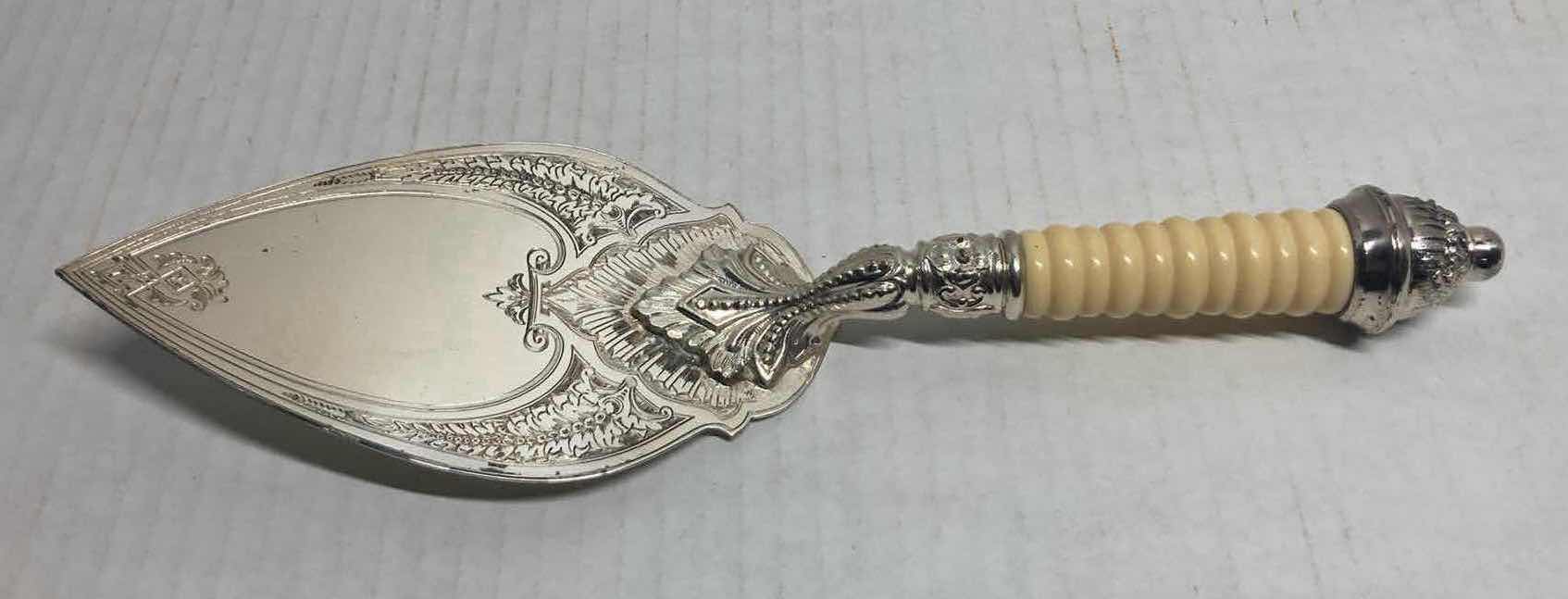 Photo 1 of ANTIQUE VICTORIAN SILVER PLATED CAKE SERVER W CELLULOID HANDLE & INTERNATIONAL SILVER COMPANY SILVER PLATED CAKE SERVER 11.75”