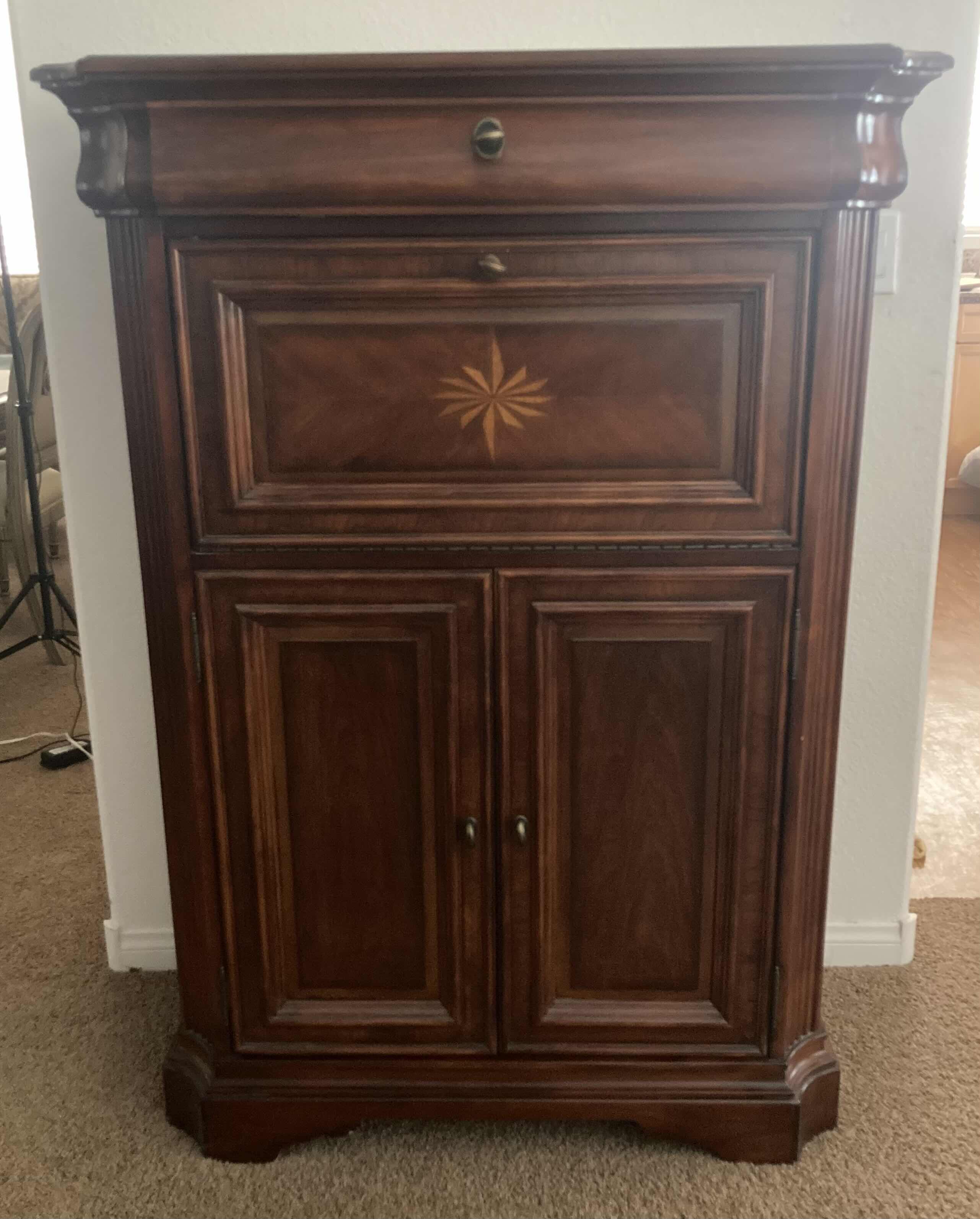 Photo 1 of DARK CHERRY FINSH LIQUOR CABINET (CONTENTS INCLUDED) 38.5” X 18” H54”