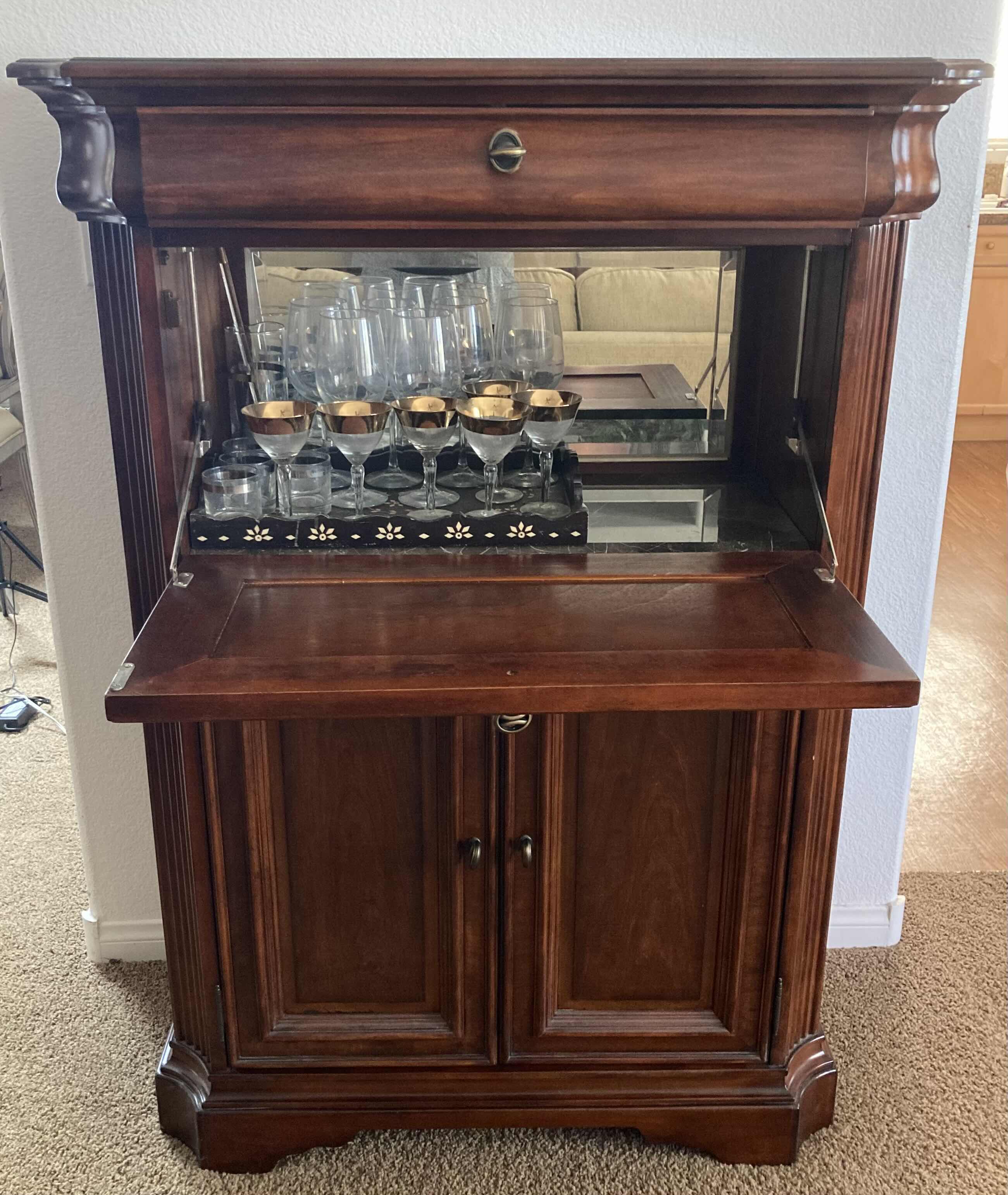 Photo 1 of DARK CHERRY FINSH LIQUOR CABINET (CONTENTS INCLUDED) 38.5” X 18” H54”