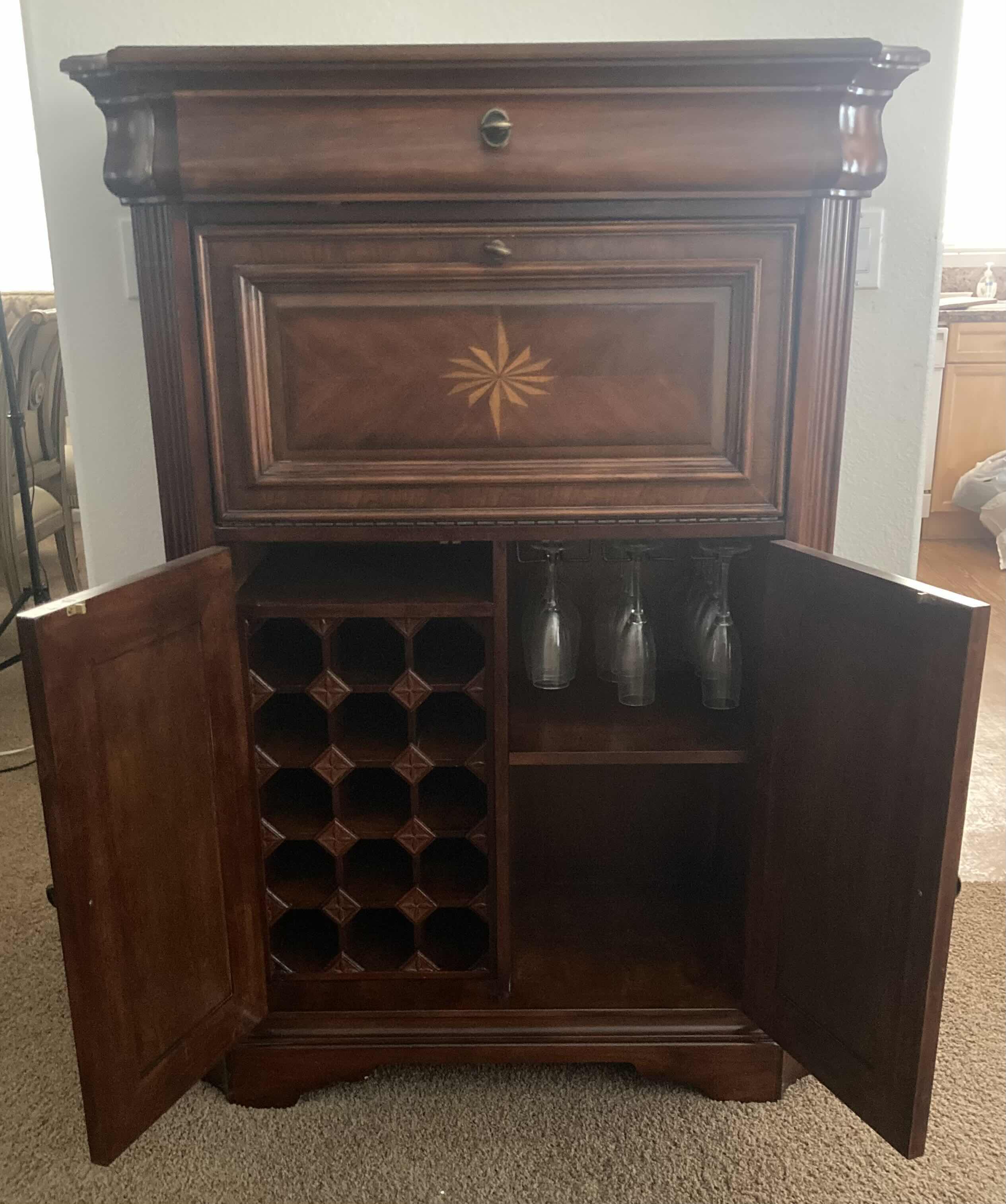 Photo 1 of DARK CHERRY FINSH LIQUOR CABINET (CONTENTS INCLUDED) 38.5” X 18” H54”