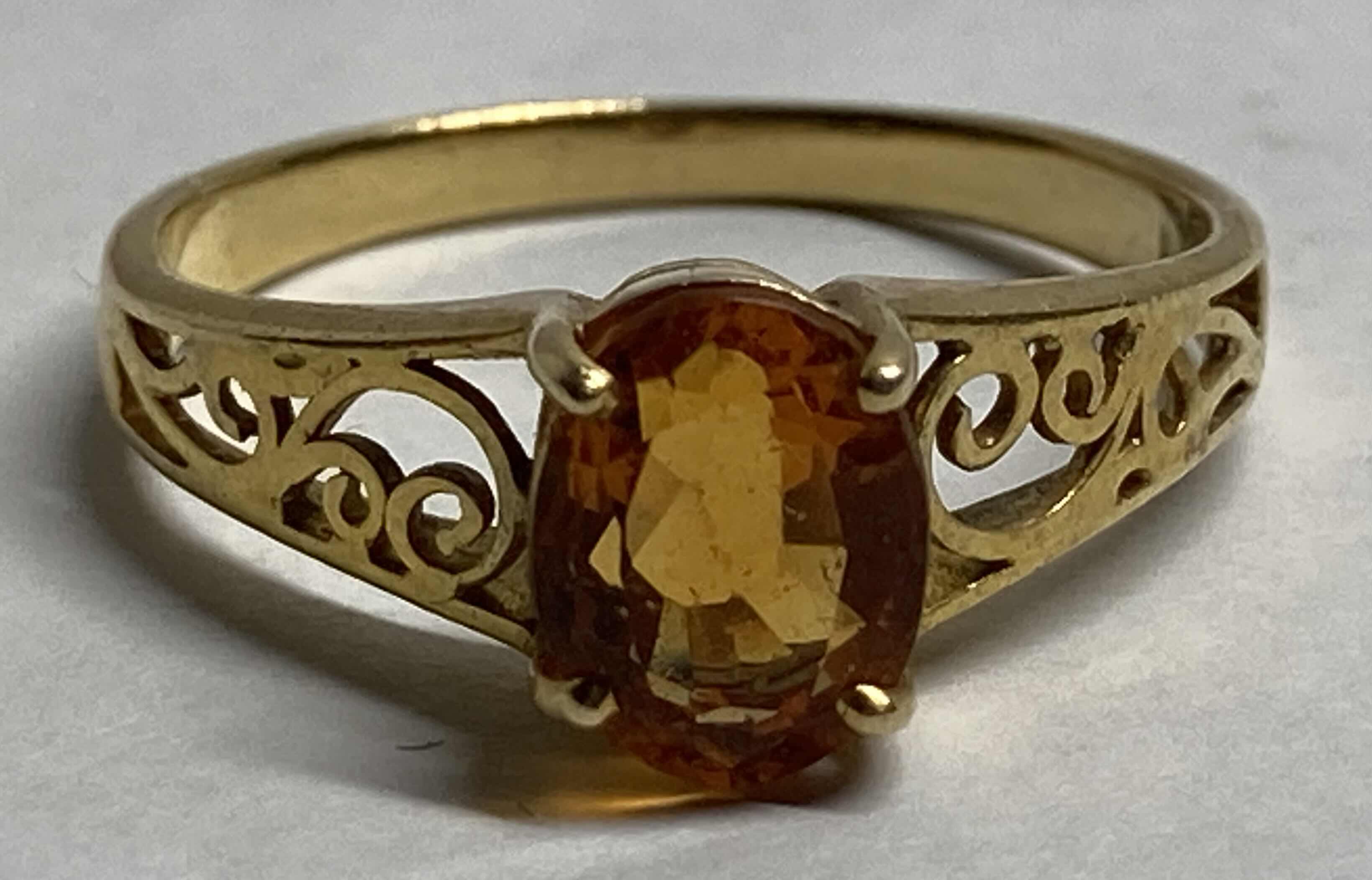 Photo 1 of GOLD RING WITH GOLD STONE APPROX RING SIZE 7-7.5