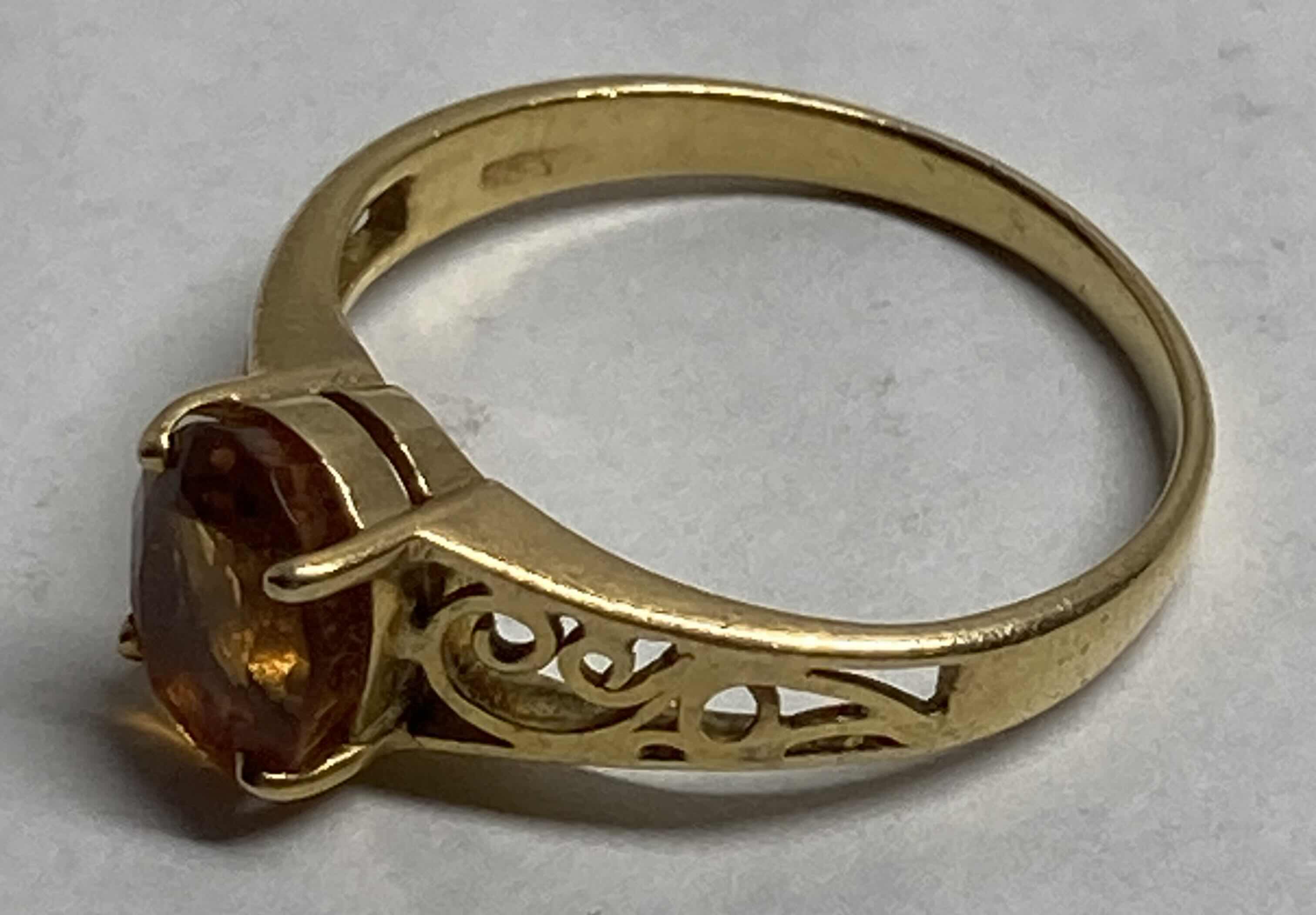 Photo 1 of GOLD RING WITH GOLD STONE APPROX RING SIZE 7-7.5