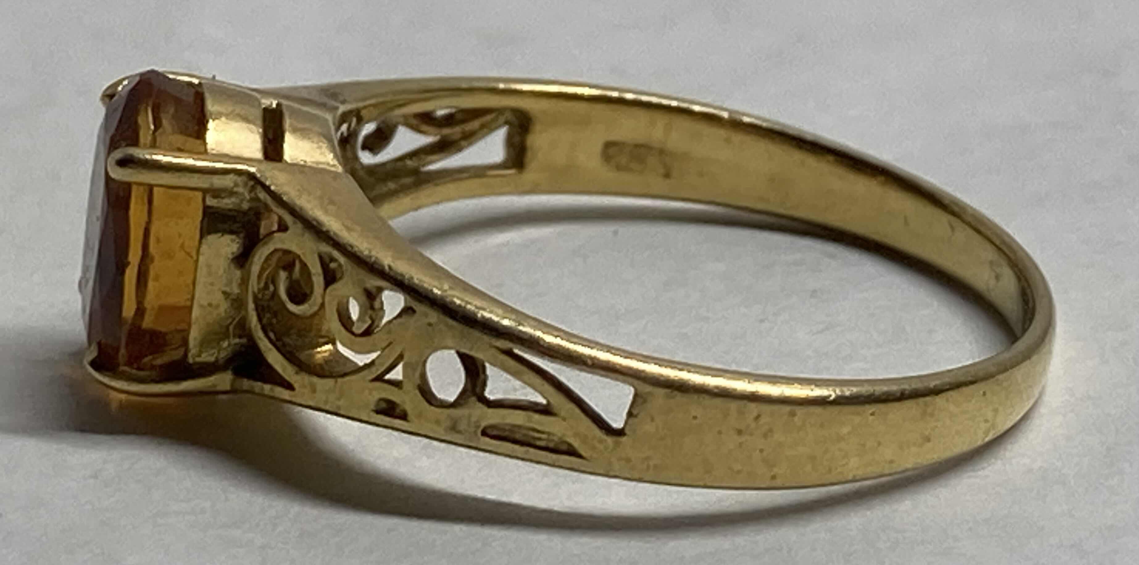 Photo 1 of GOLD RING WITH GOLD STONE APPROX RING SIZE 7-7.5