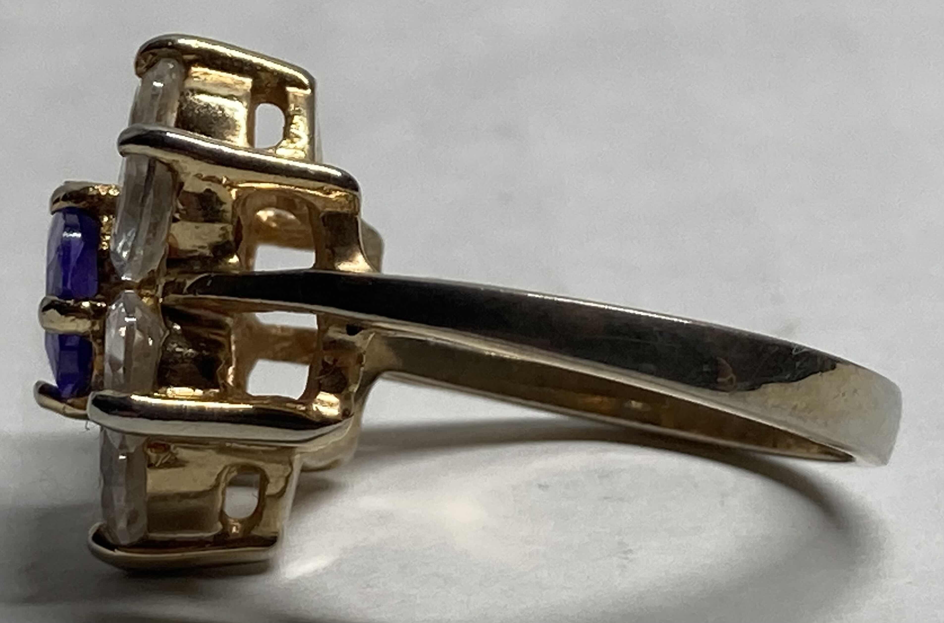 Photo 1 of GOLD FLOWER RING W PURPLE & CLEAR STONES APPROX RING SIZE 9-9.5