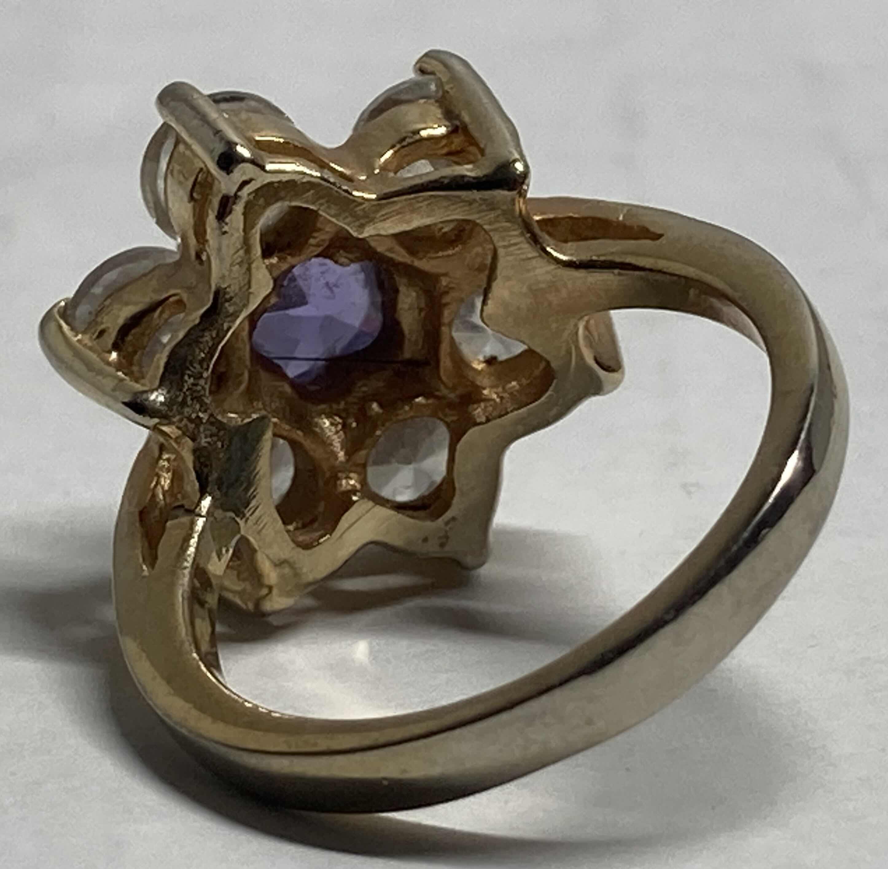Photo 1 of GOLD FLOWER RING W PURPLE & CLEAR STONES APPROX RING SIZE 9-9.5