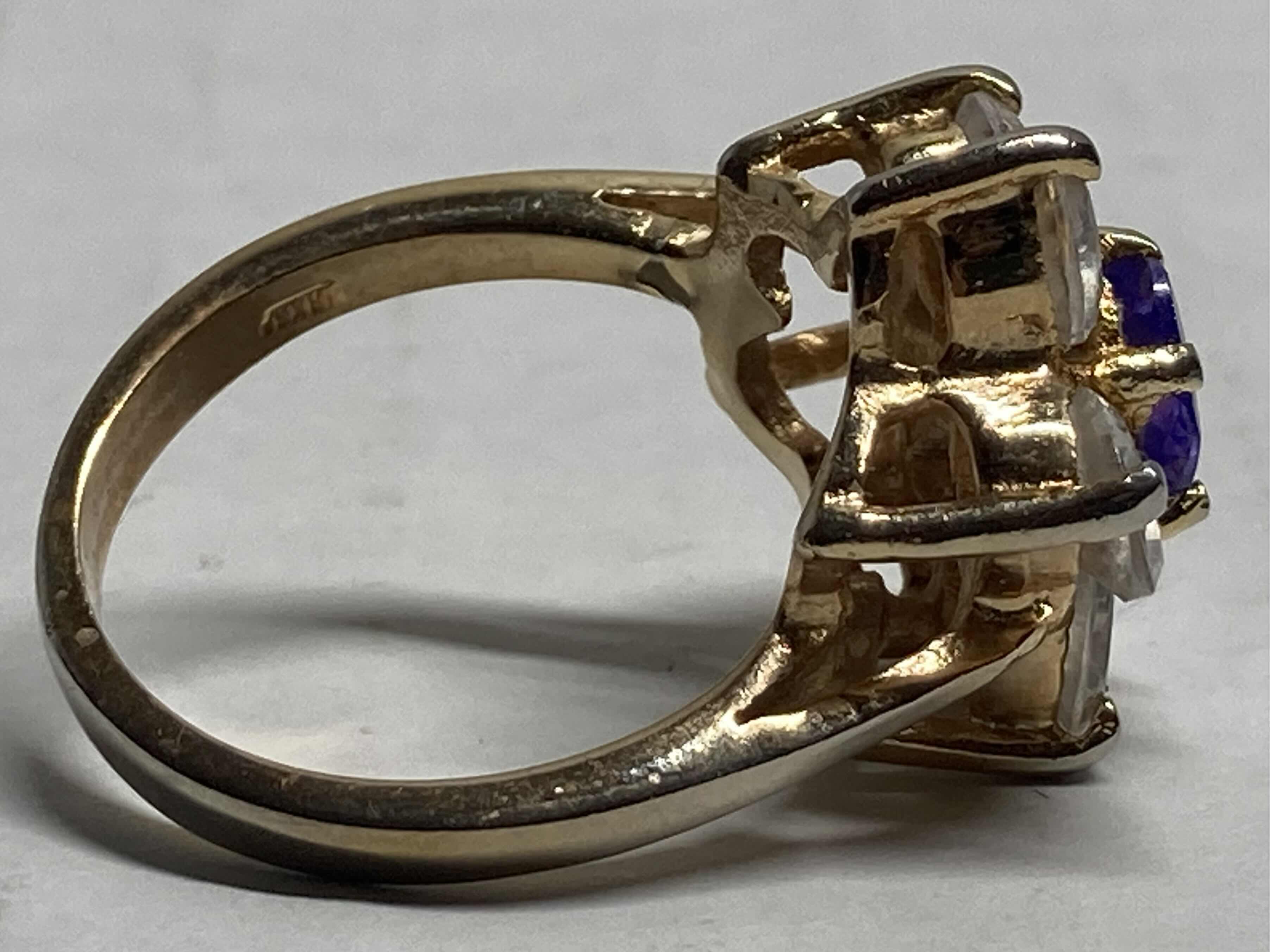 Photo 1 of GOLD FLOWER RING W PURPLE & CLEAR STONES APPROX RING SIZE 9-9.5