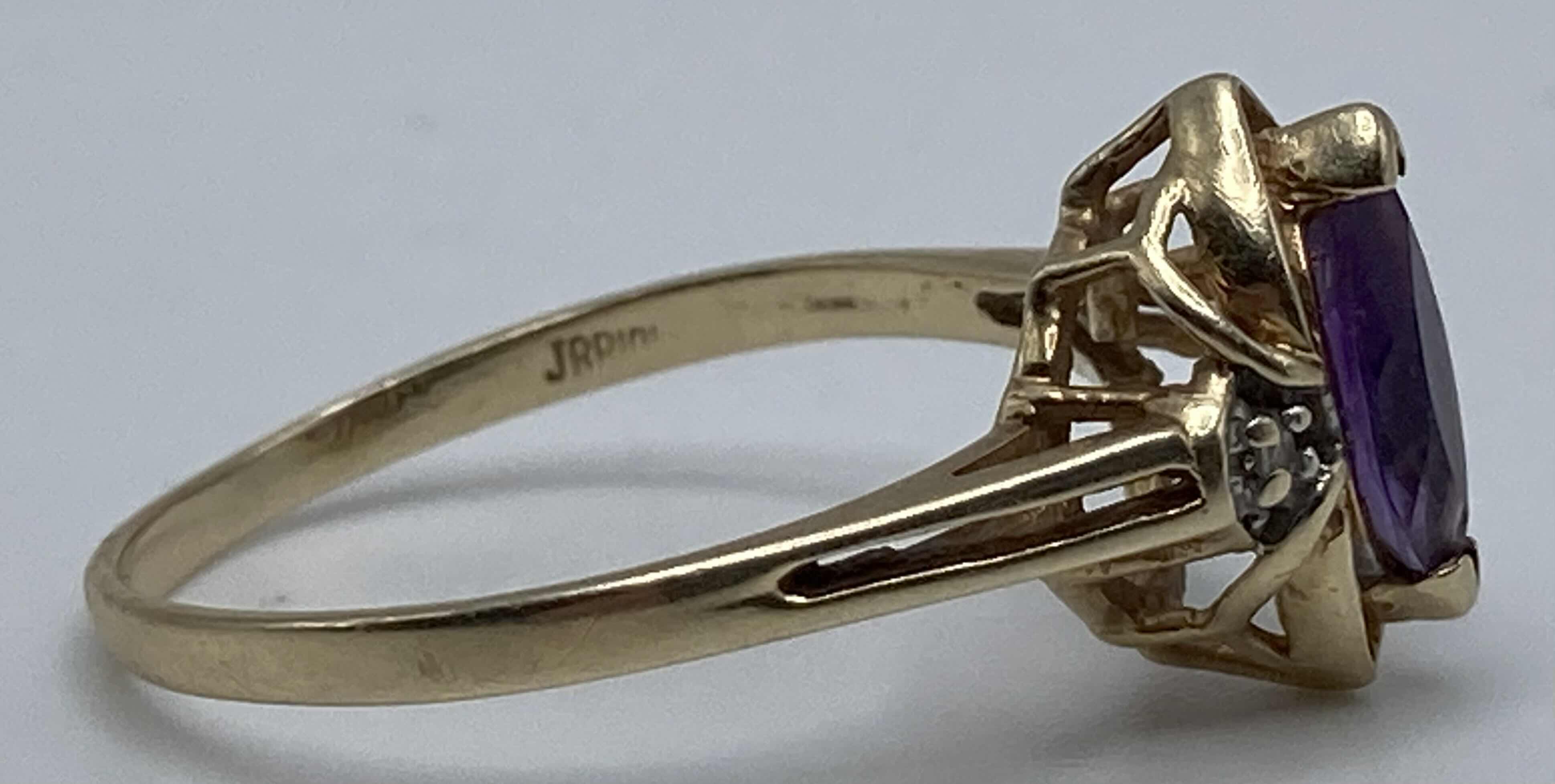 Photo 1 of GOLD RING W PURPLE STONE APPROX RING SIZE 8.5-9