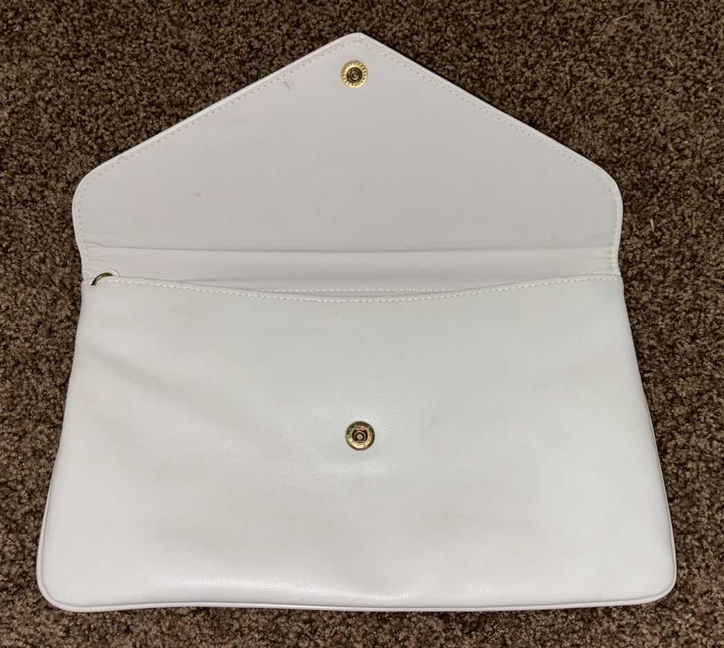 Photo 1 of CLUTCH STYLE PURSES (2)