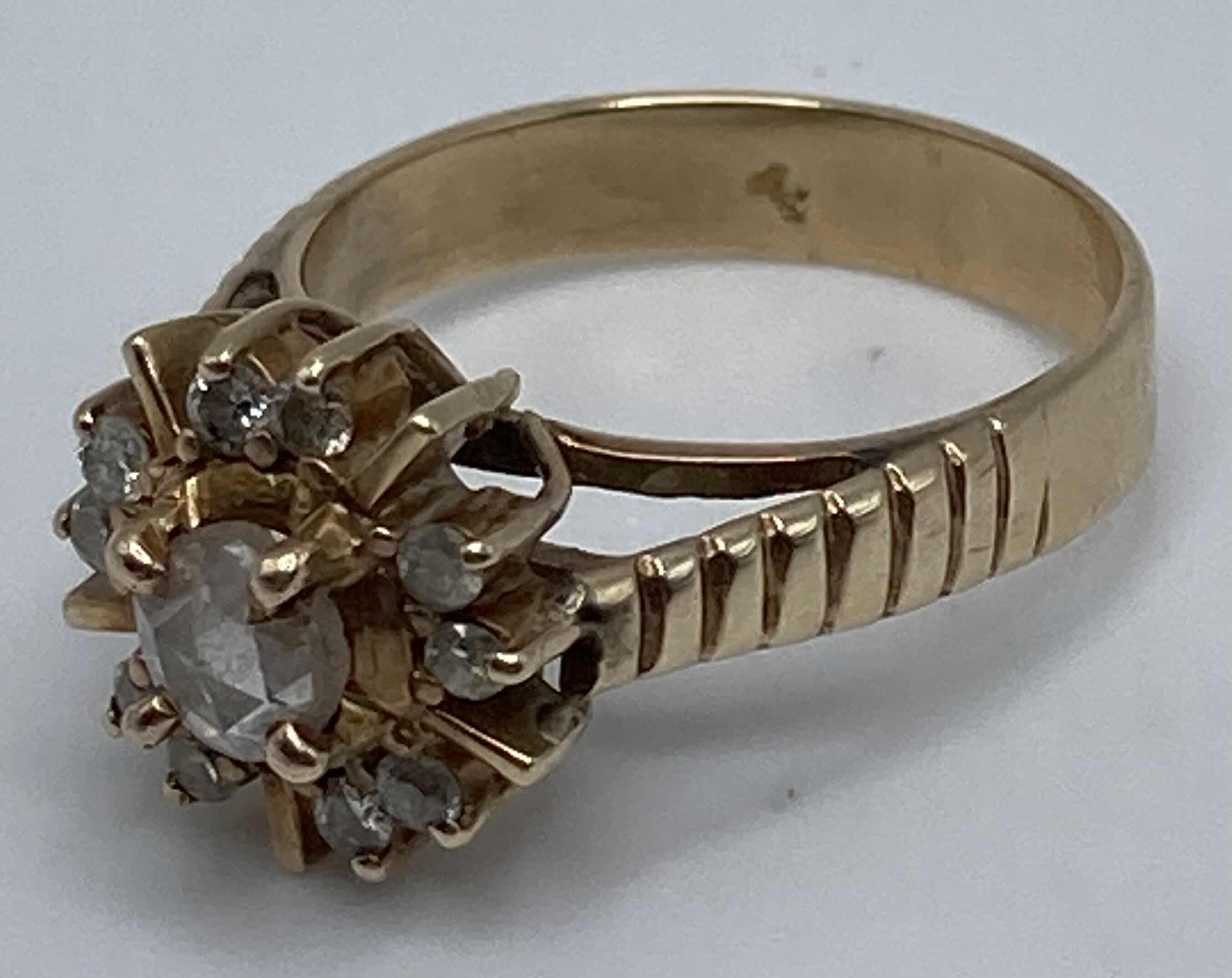 Photo 1 of GOLD RING W CLEAR STONES APPROX RING SIZE 7-7.5