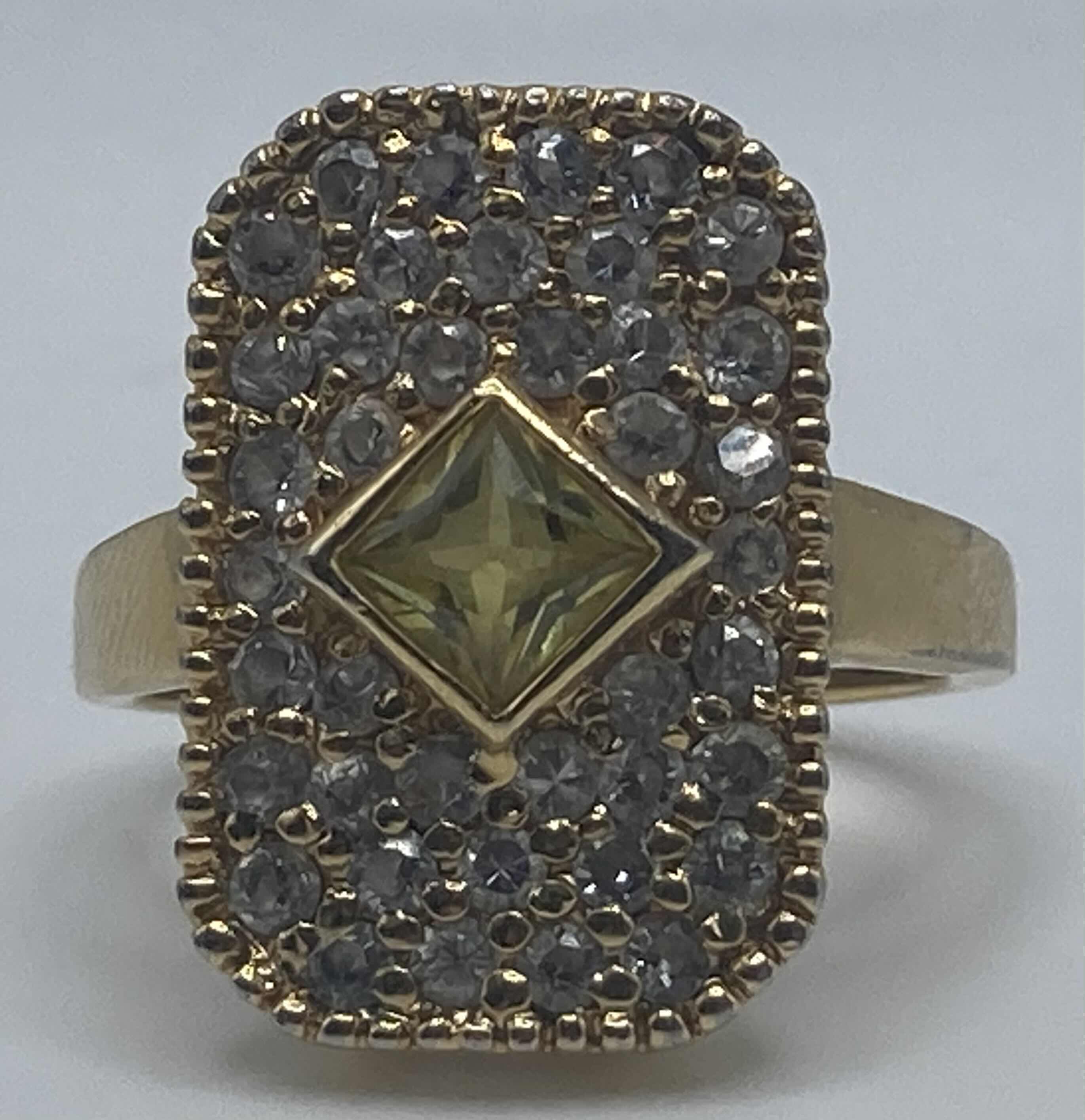 Photo 1 of GOLD PLATED 925 SILVER RING W YELLOW & CLEAR STONES APPROX RING SIZE 8.5-9